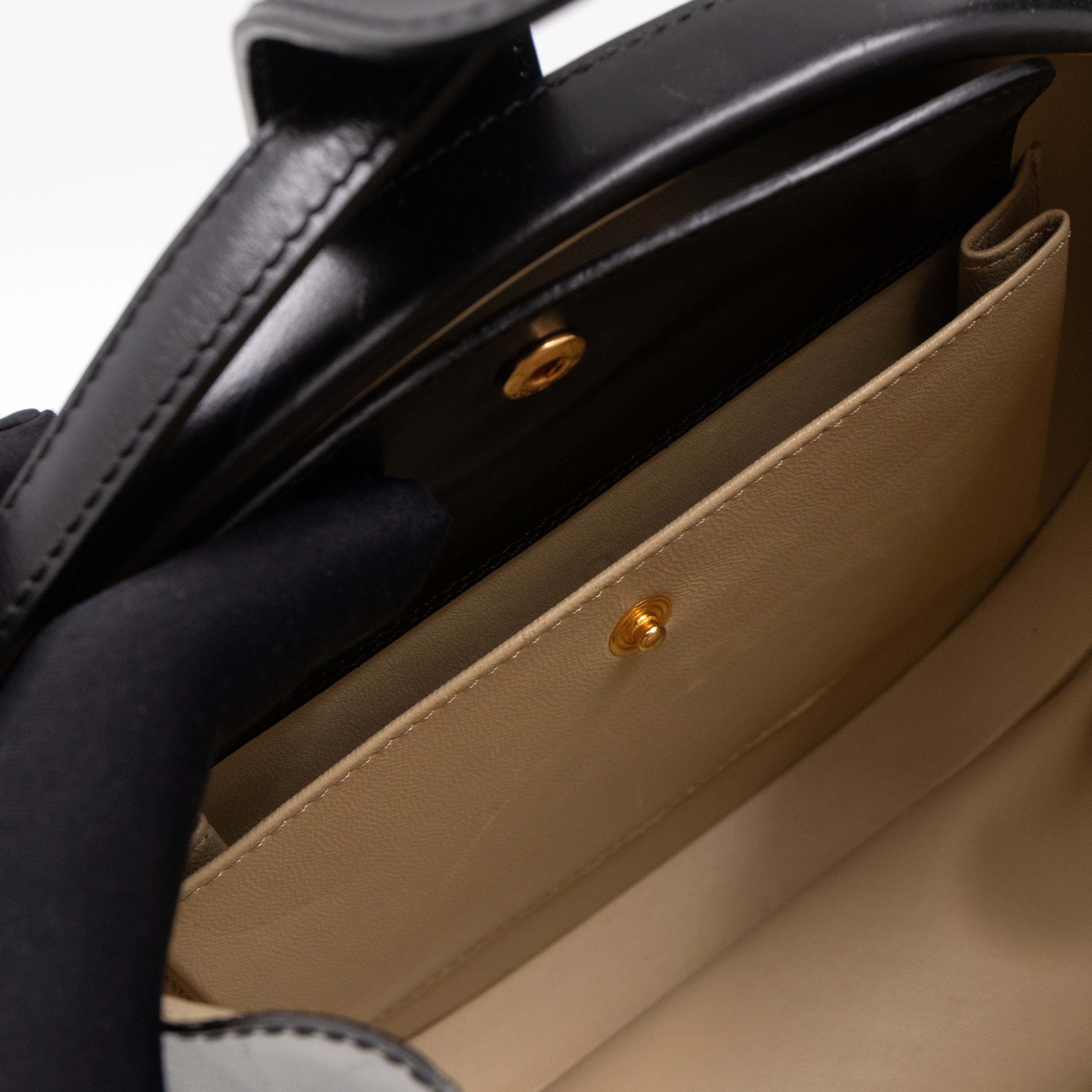 Anagram Round Top Handle Bag Black Calfskin