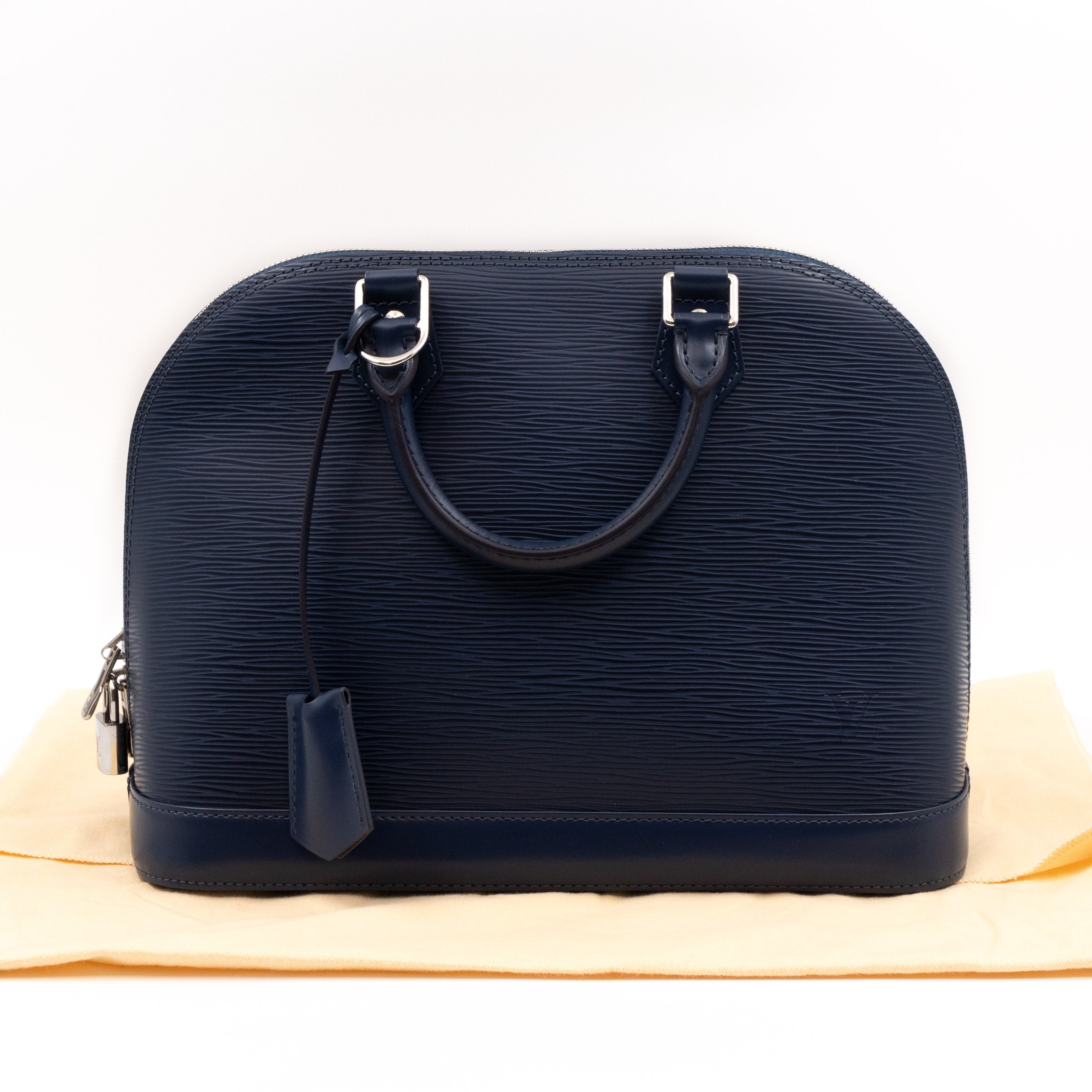 Isabella's Wardrobe - Louis Vuitton Alma PM Epi Leather Indigo Bag -  in-store now! #designer #luxury #LouisVuitton #fashion #style #handbags  #preowned #consignment #designerbags #black #ootd #fashionstyle #Glasgow  #westend #scotland