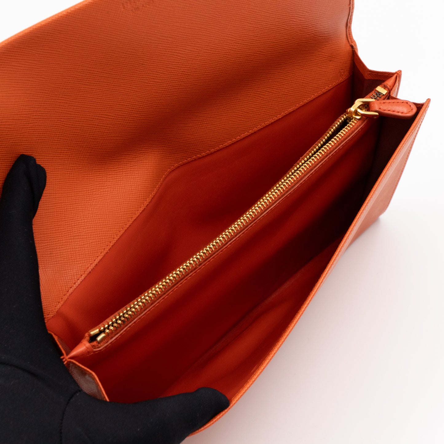 Flat Clutch with Stretch Band Orange Saffiano