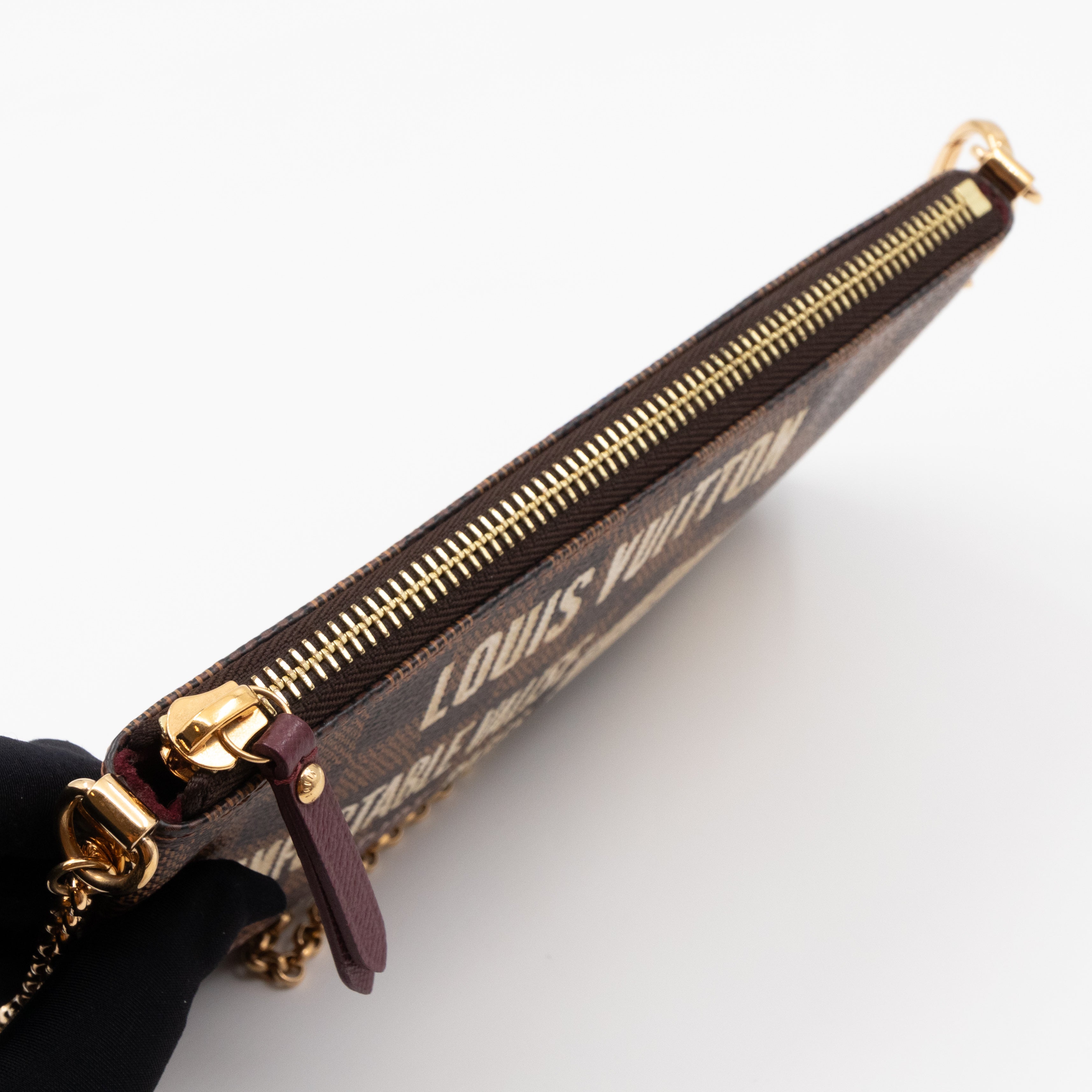 Milla MM Pochette Damier Ebene Trunk