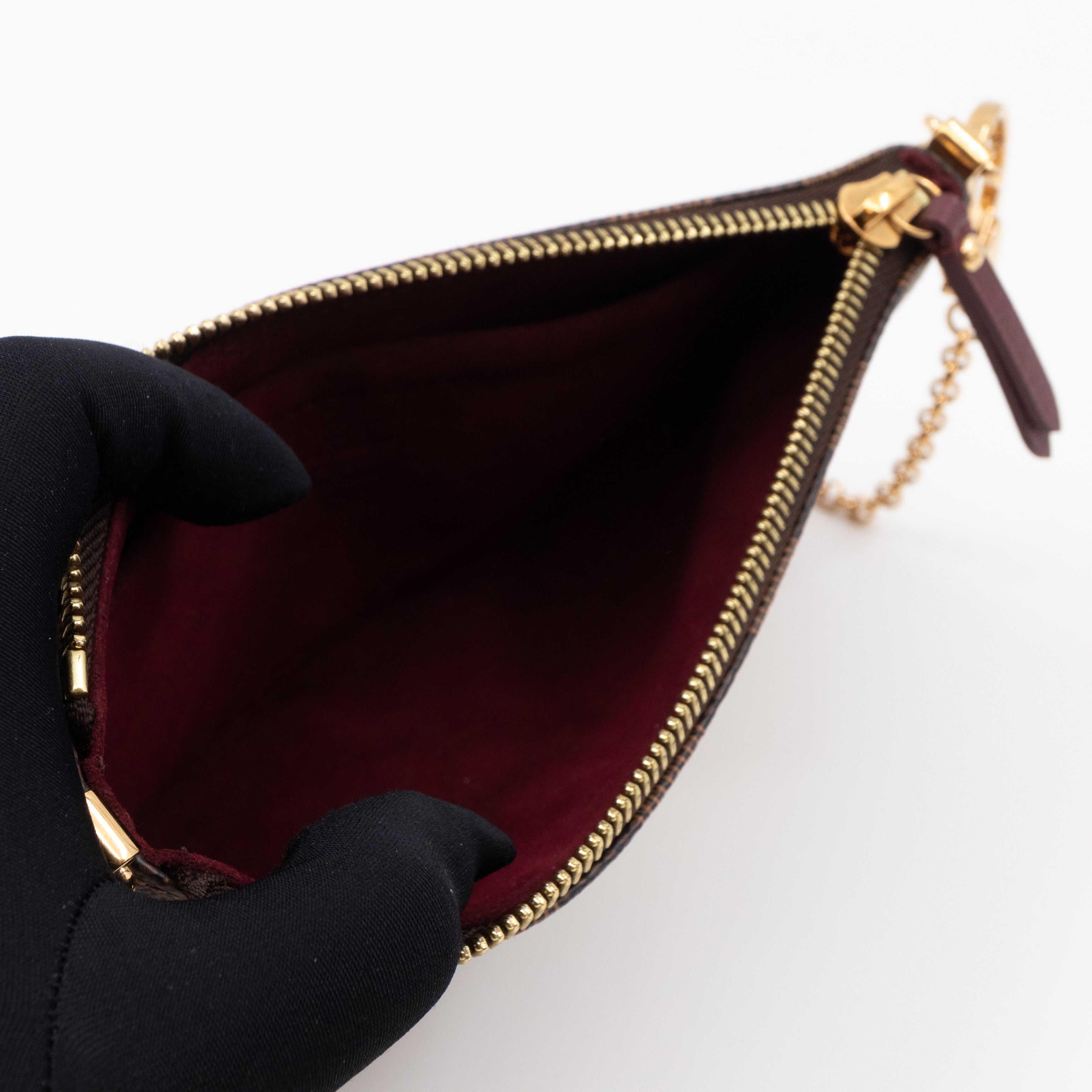 Milla MM Pochette Damier Ebene Trunk