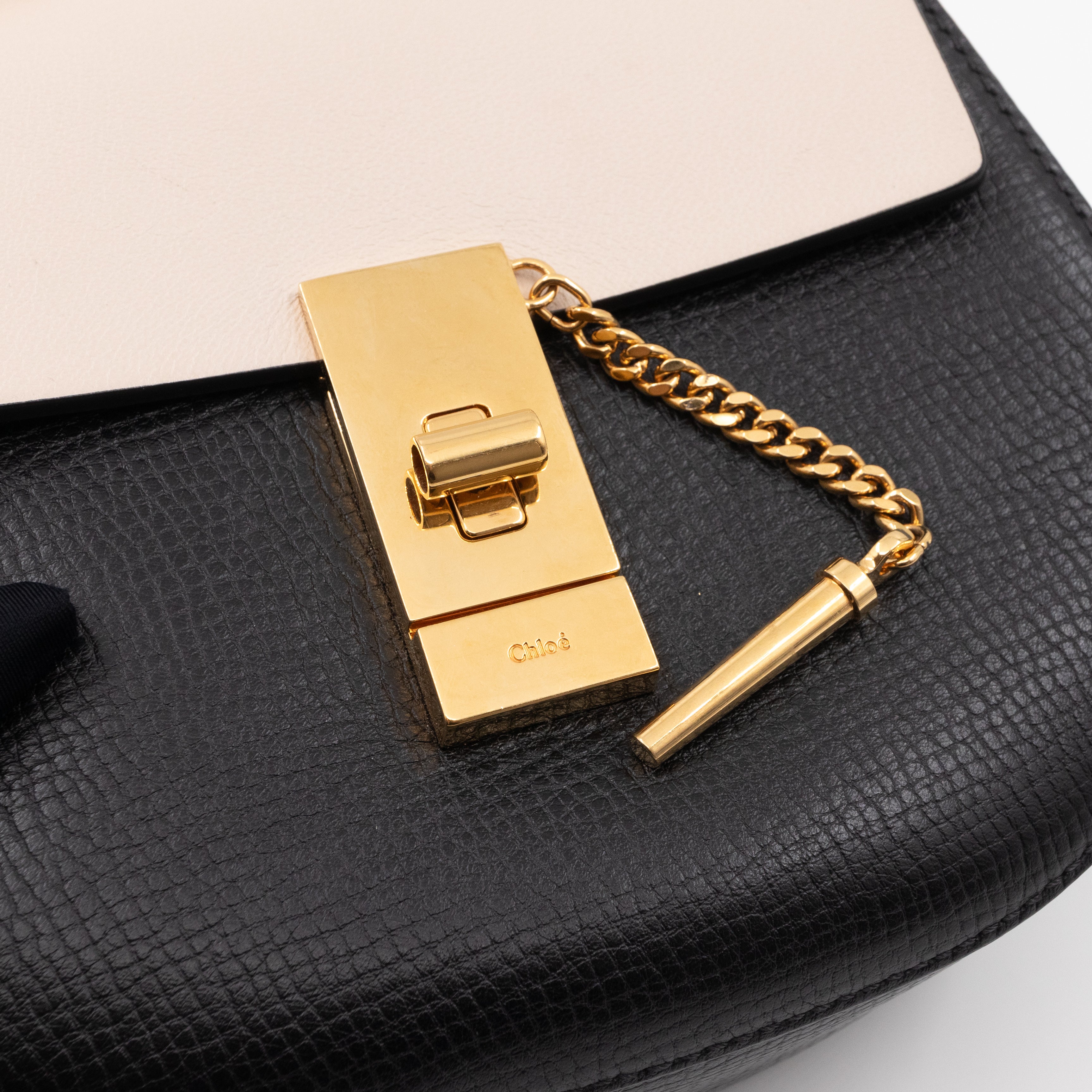 Drew Black White Leather Gold