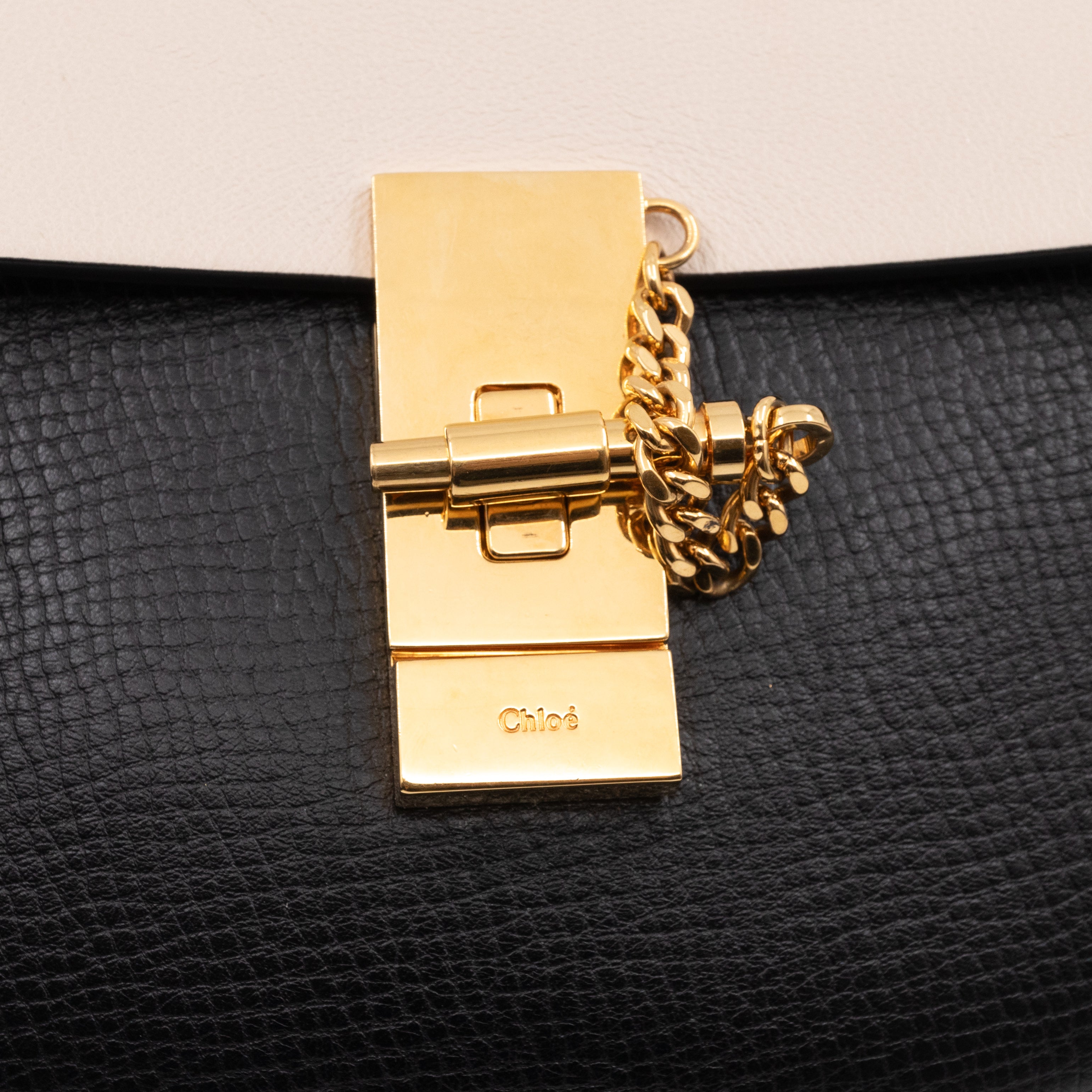 Drew Black White Leather Gold