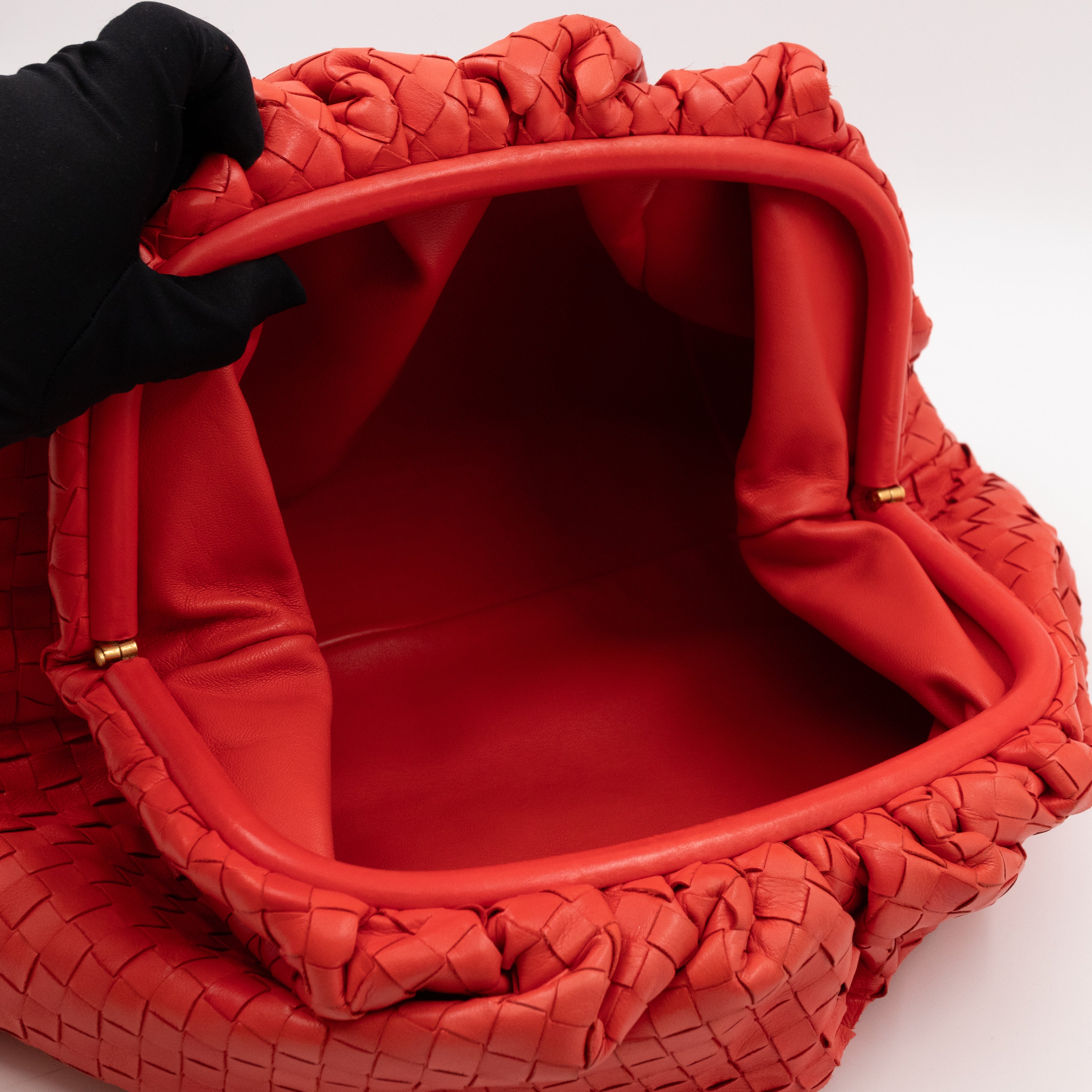 The Pouch Clutch Intrecciato Leather Coral
