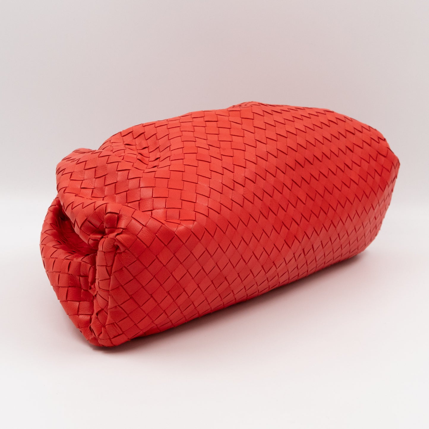 The Pouch Clutch Intrecciato Leather Coral