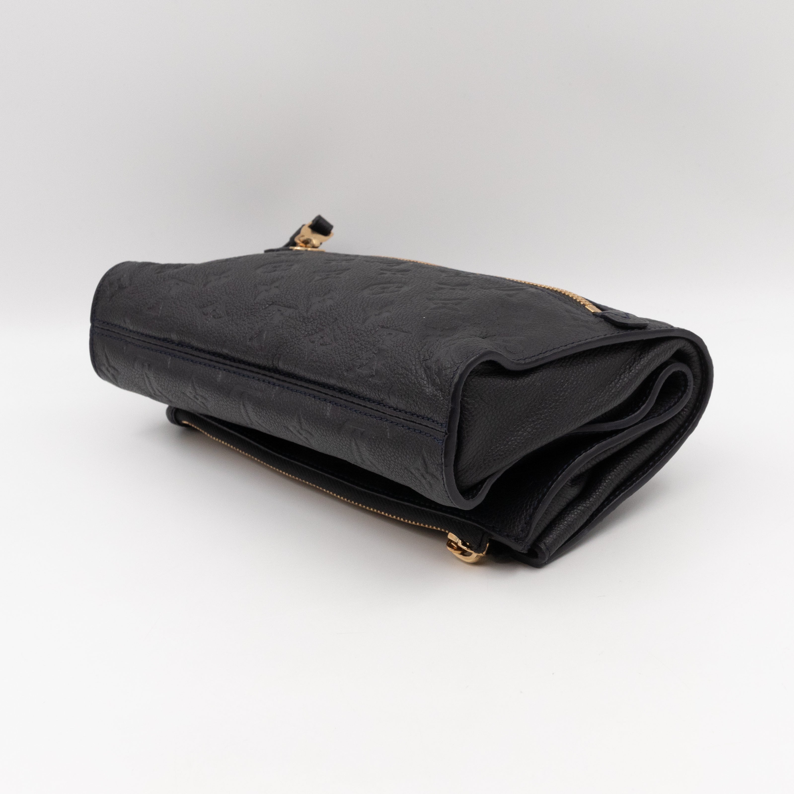 Petillante Clutch Bleu Infini Monogram Empreinte