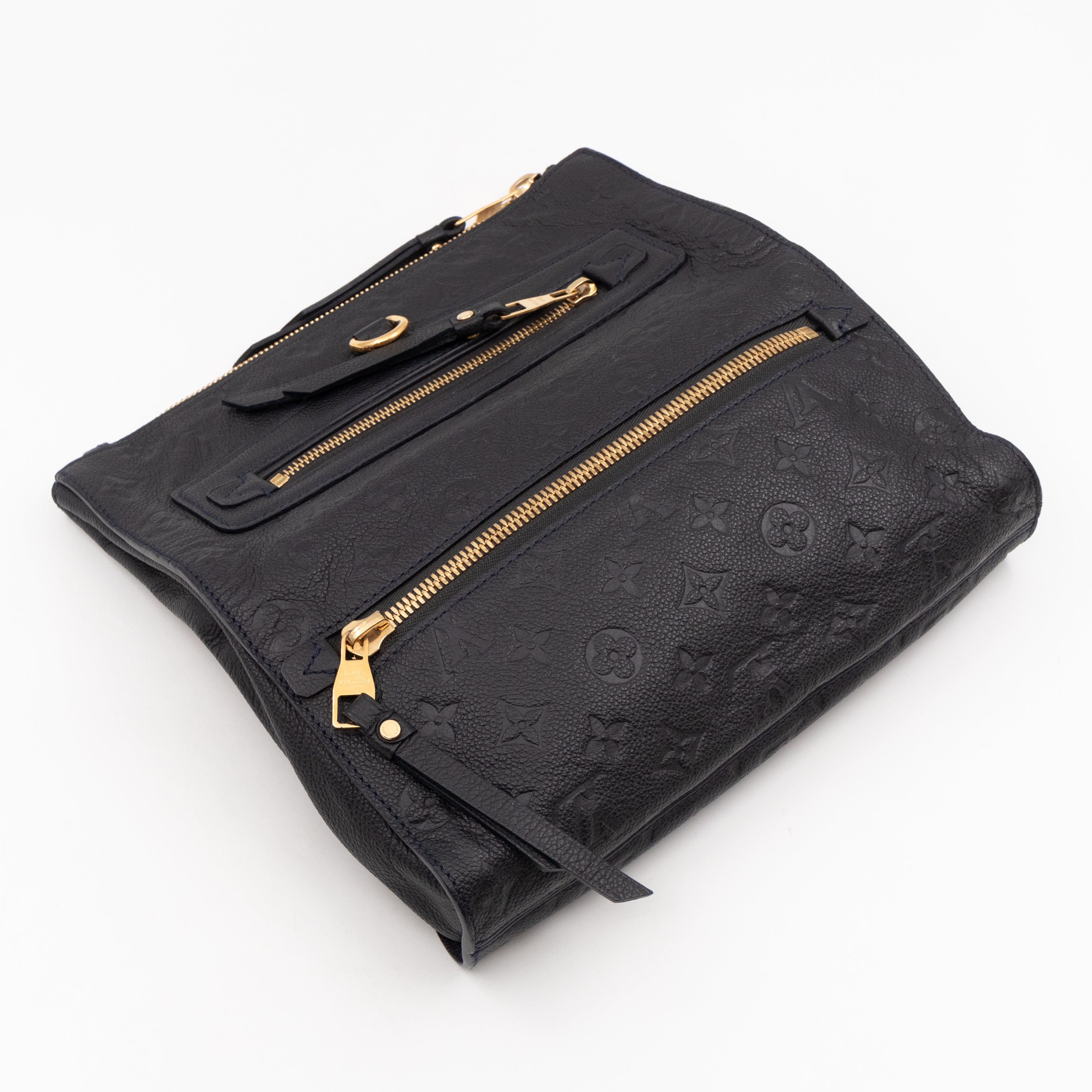 Petillante Clutch Bleu Infini Monogram Empreinte