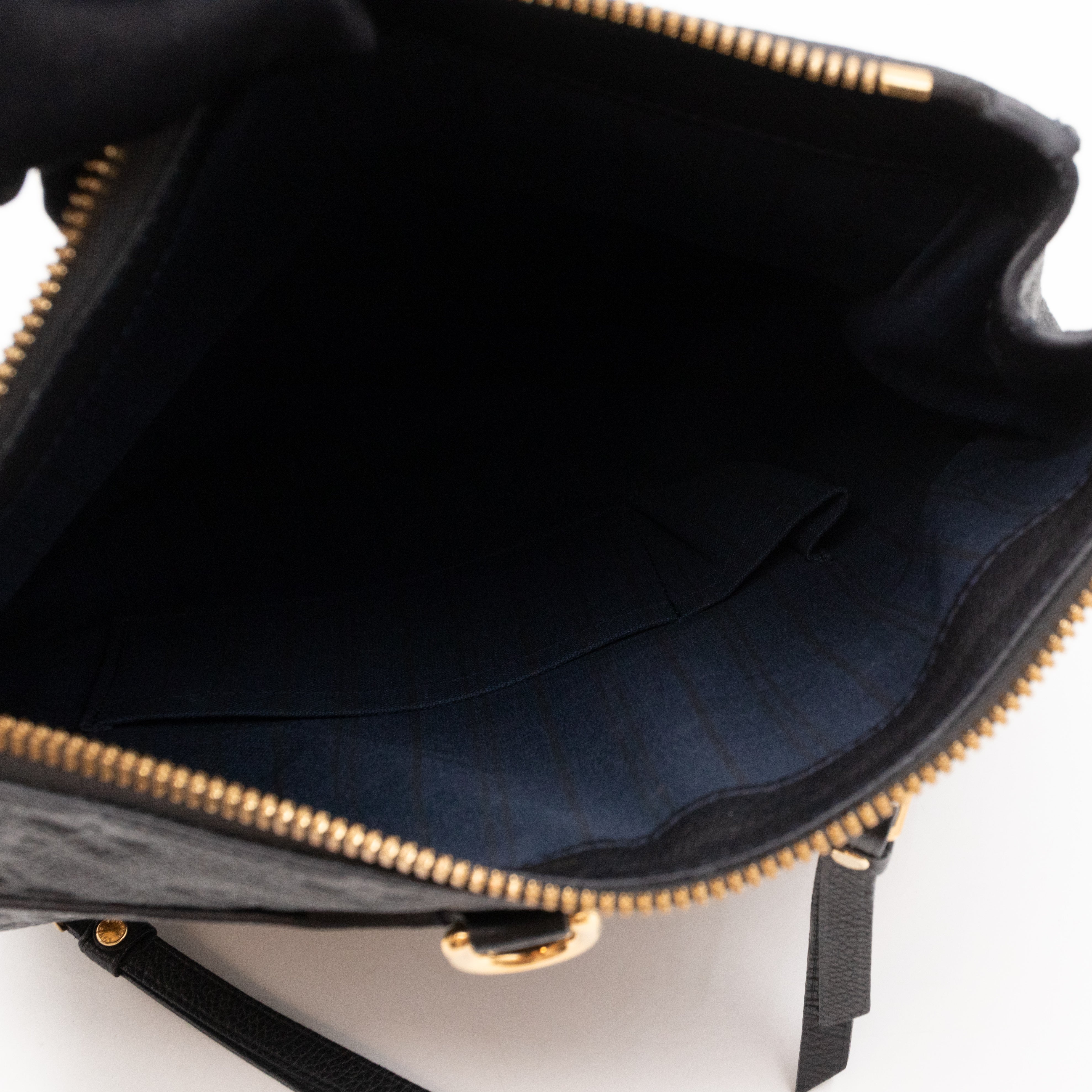 Petillante Clutch Bleu Infini Monogram Empreinte