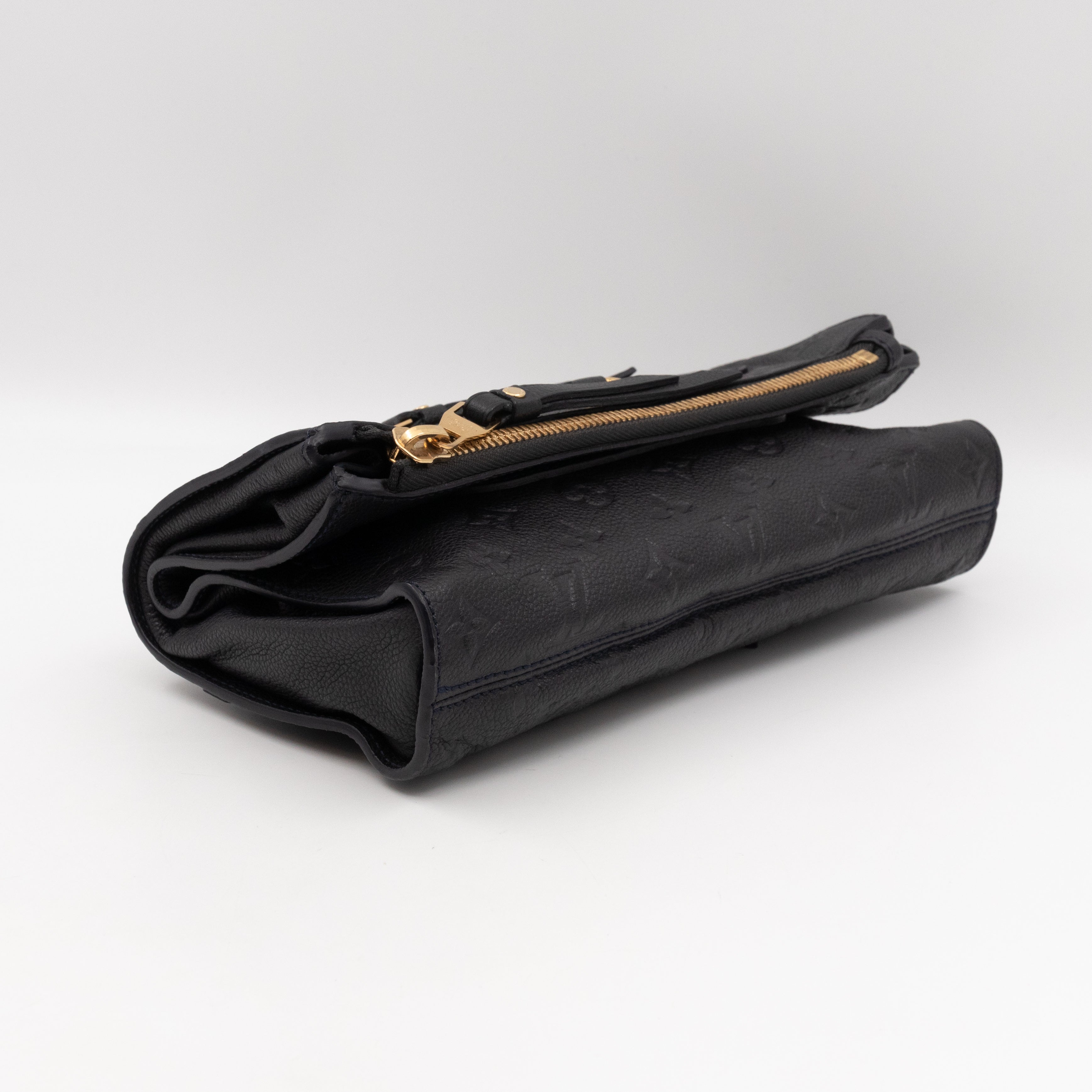 Petillante Clutch Bleu Infini Monogram Empreinte