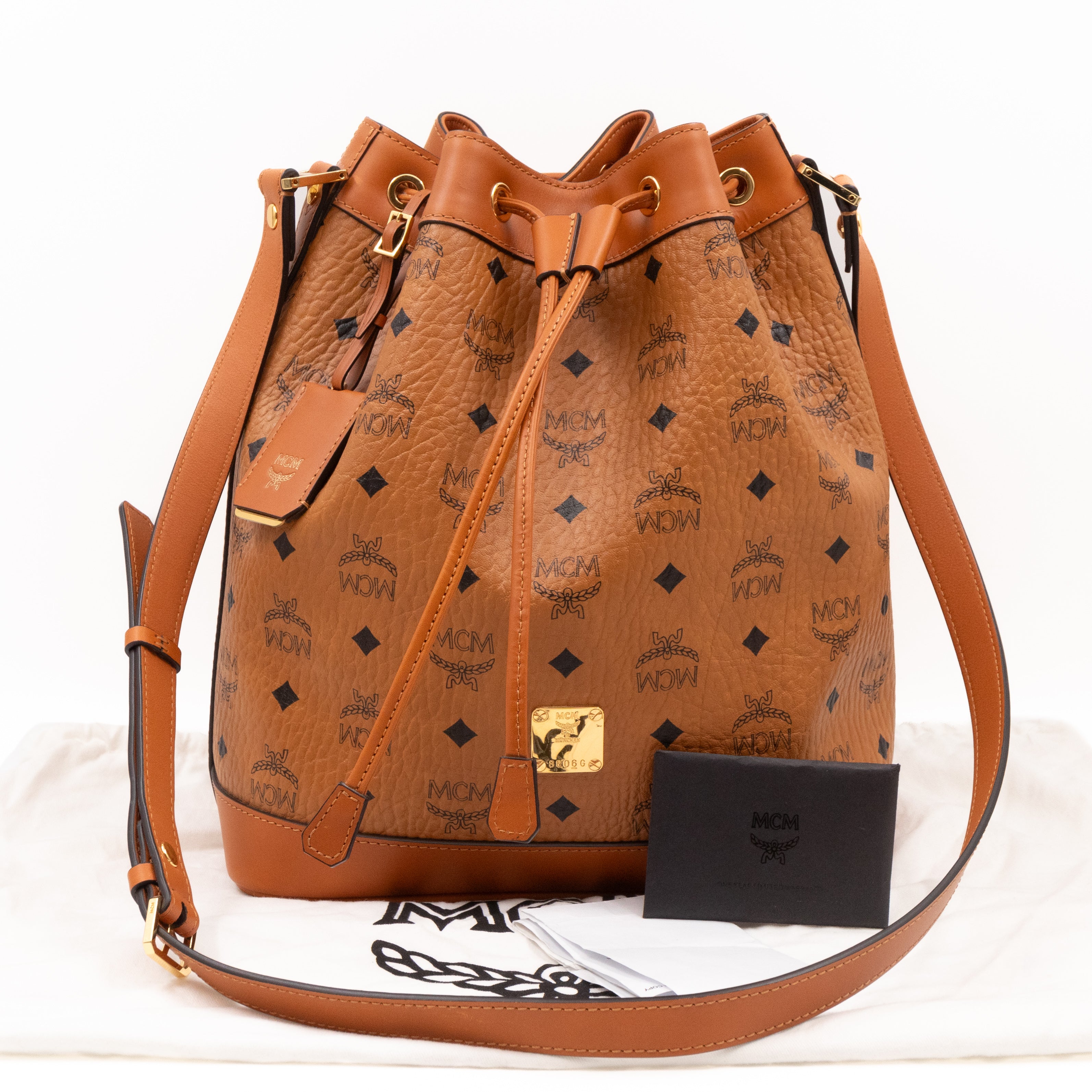 MCM Heritage Petit Drawstring Bucket Bag Visetos Cognac – Queen