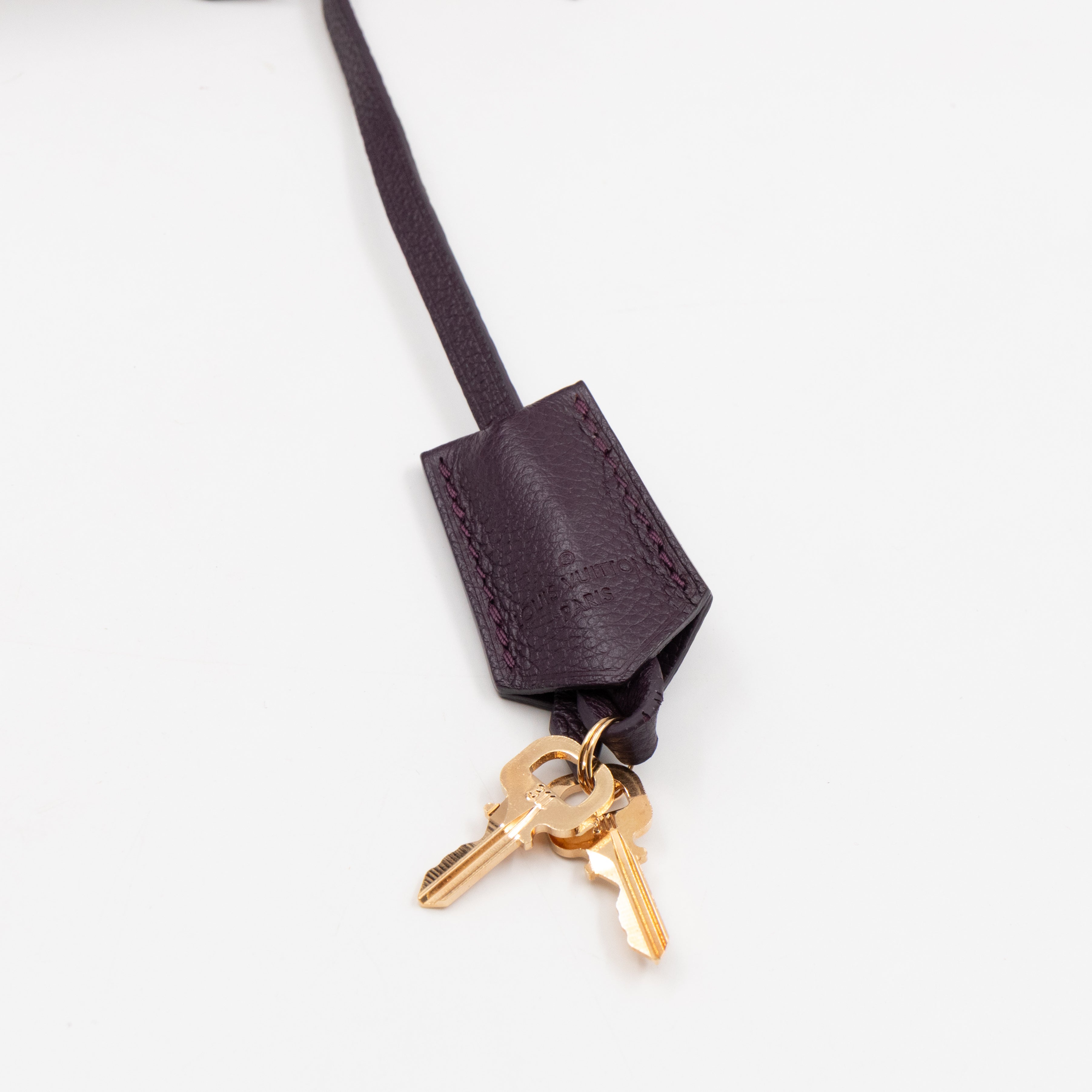 Audacieuse MM Aubergine Monogram Empreinte