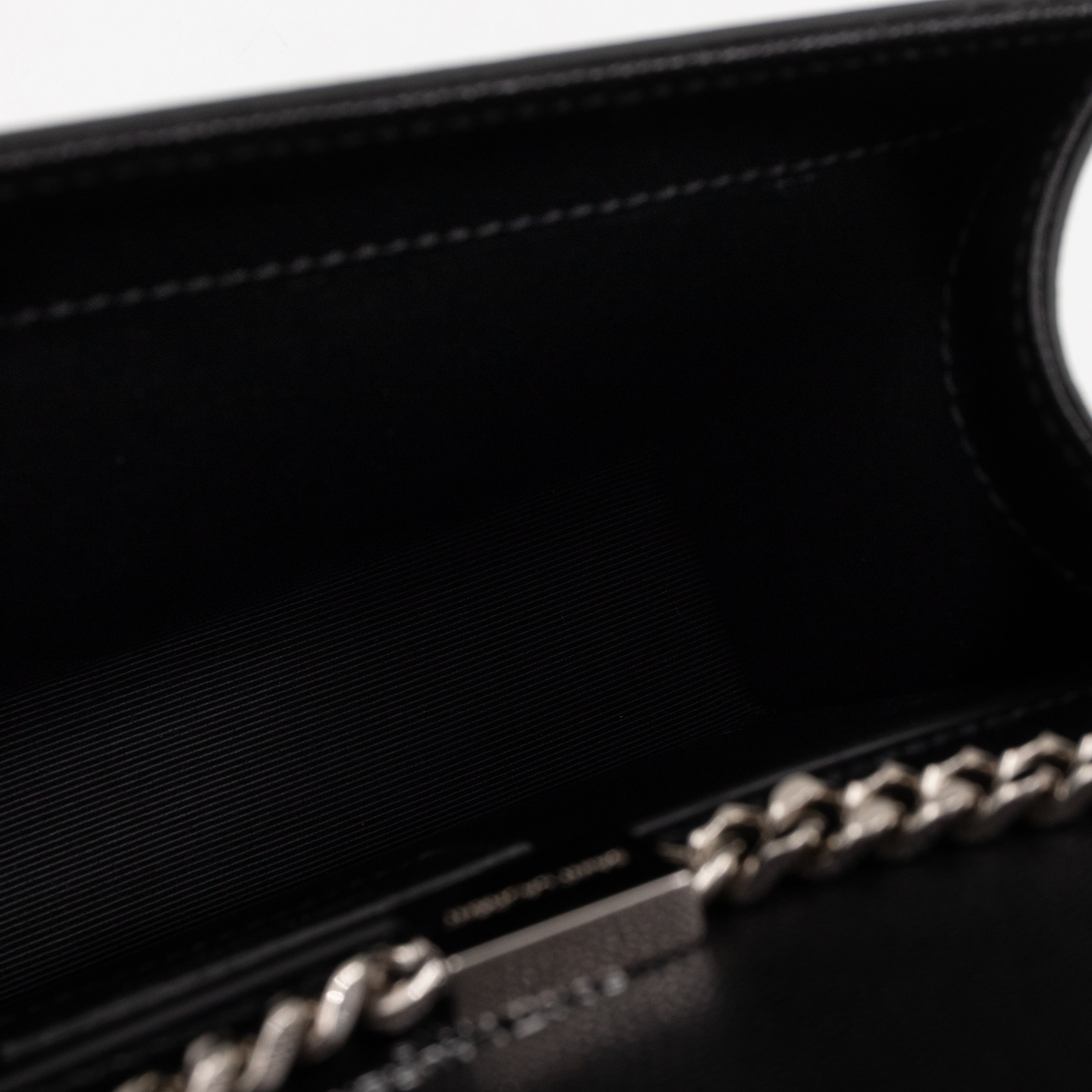 Kate Small Tassel Grained Leather Black and Silver