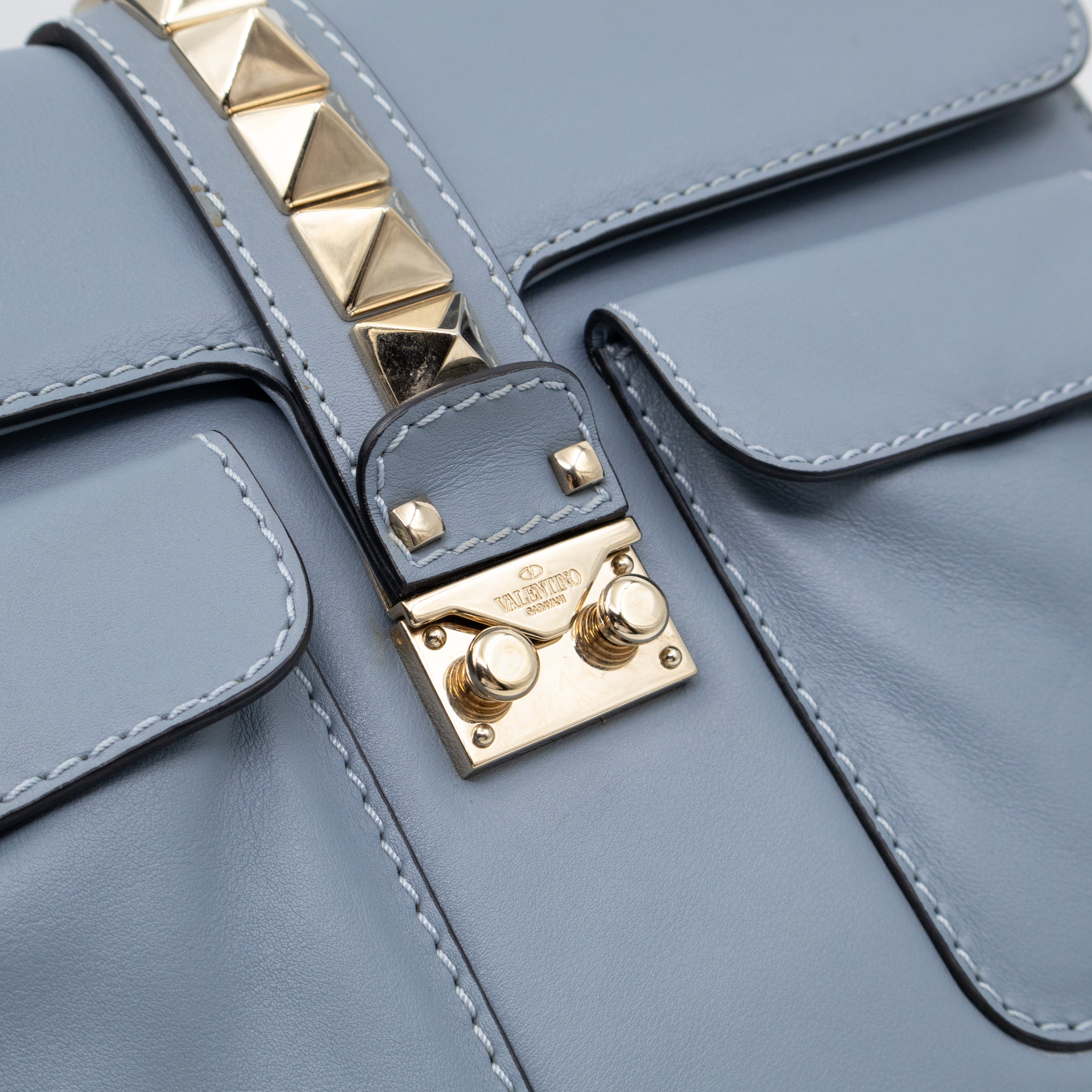 Large Rockstud Glam Lock Top Handle Bag Blue Leather