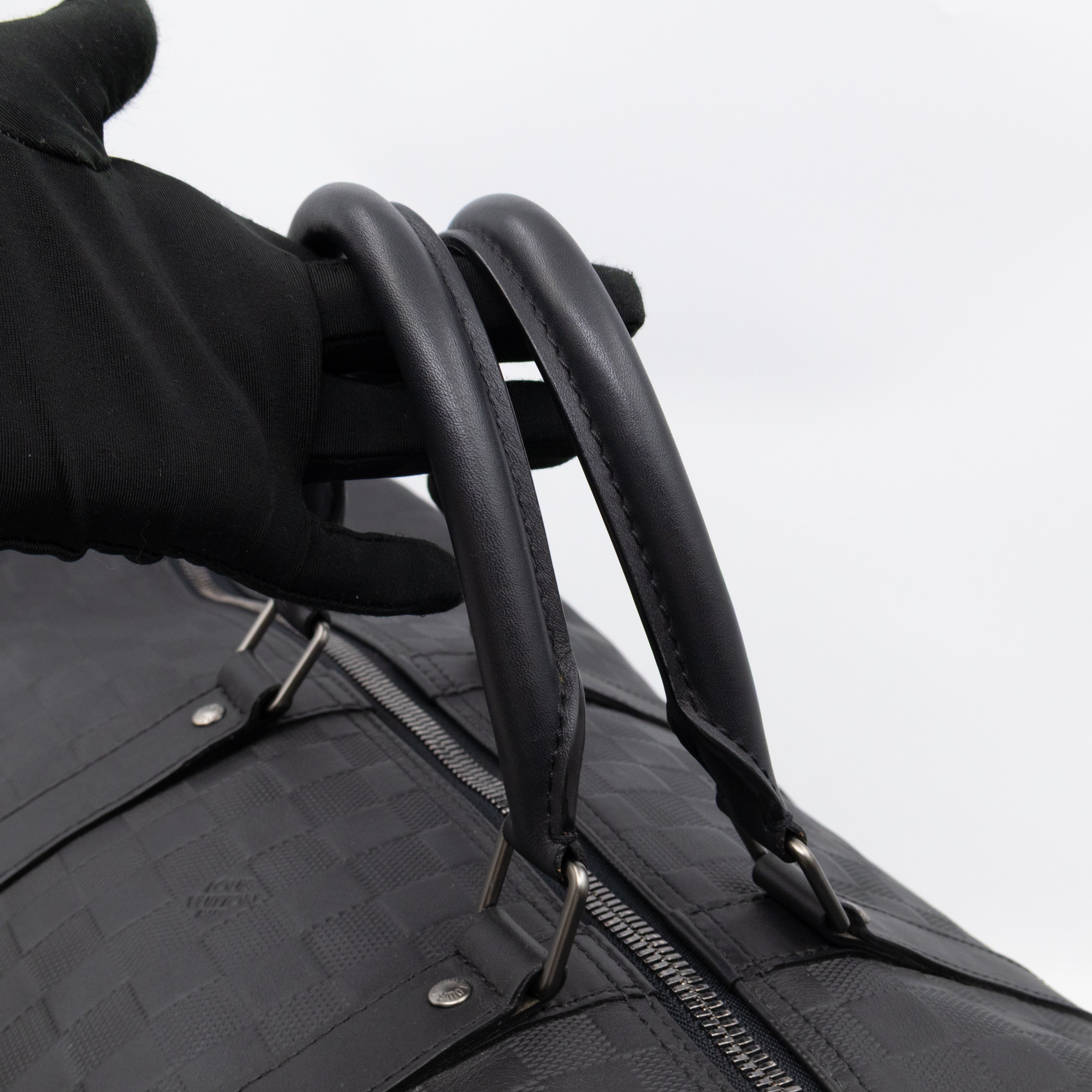 Keepall 55 Bandouliere Onyx Damier Infini Leather