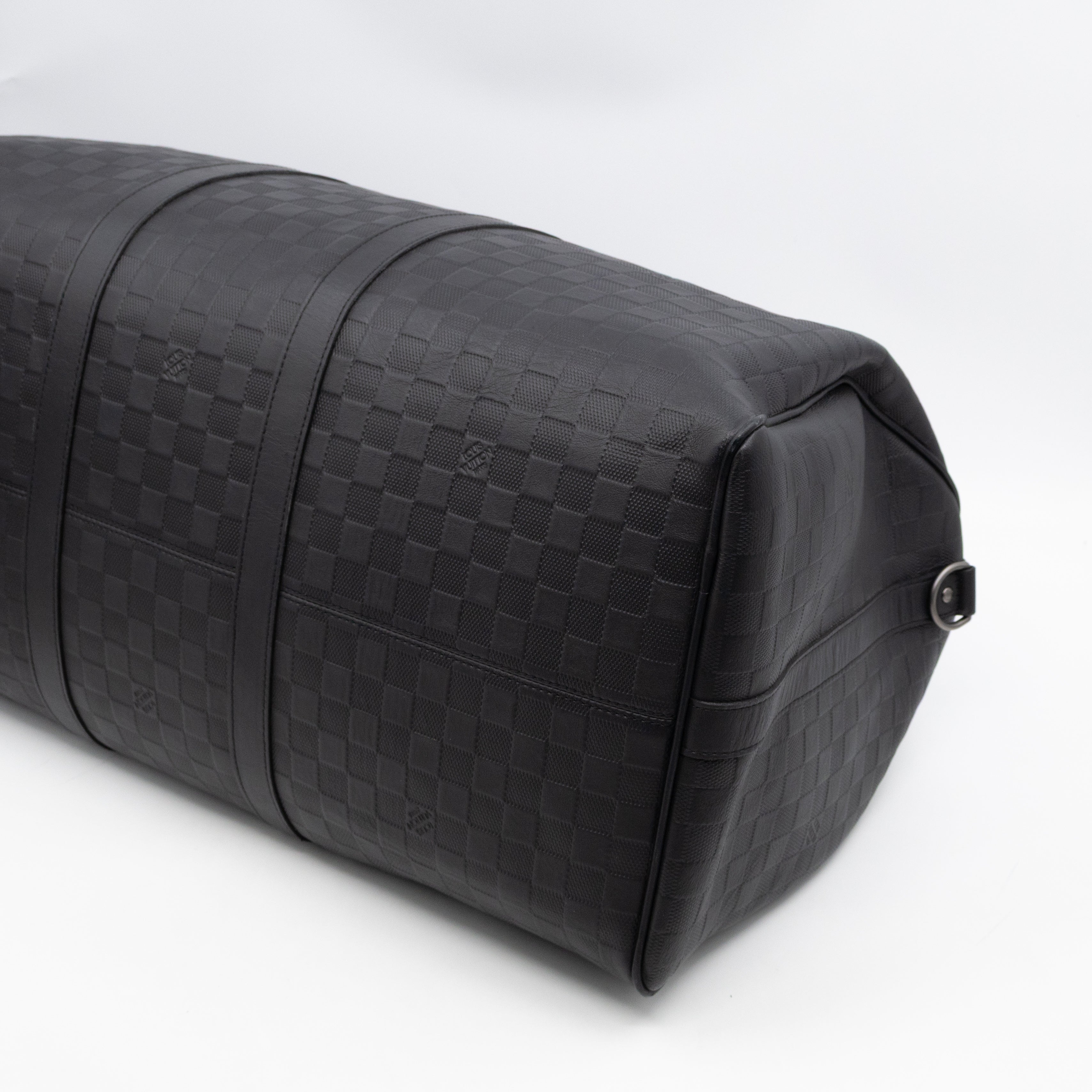 Keepall 55 Bandouliere Onyx Damier Infini Leather