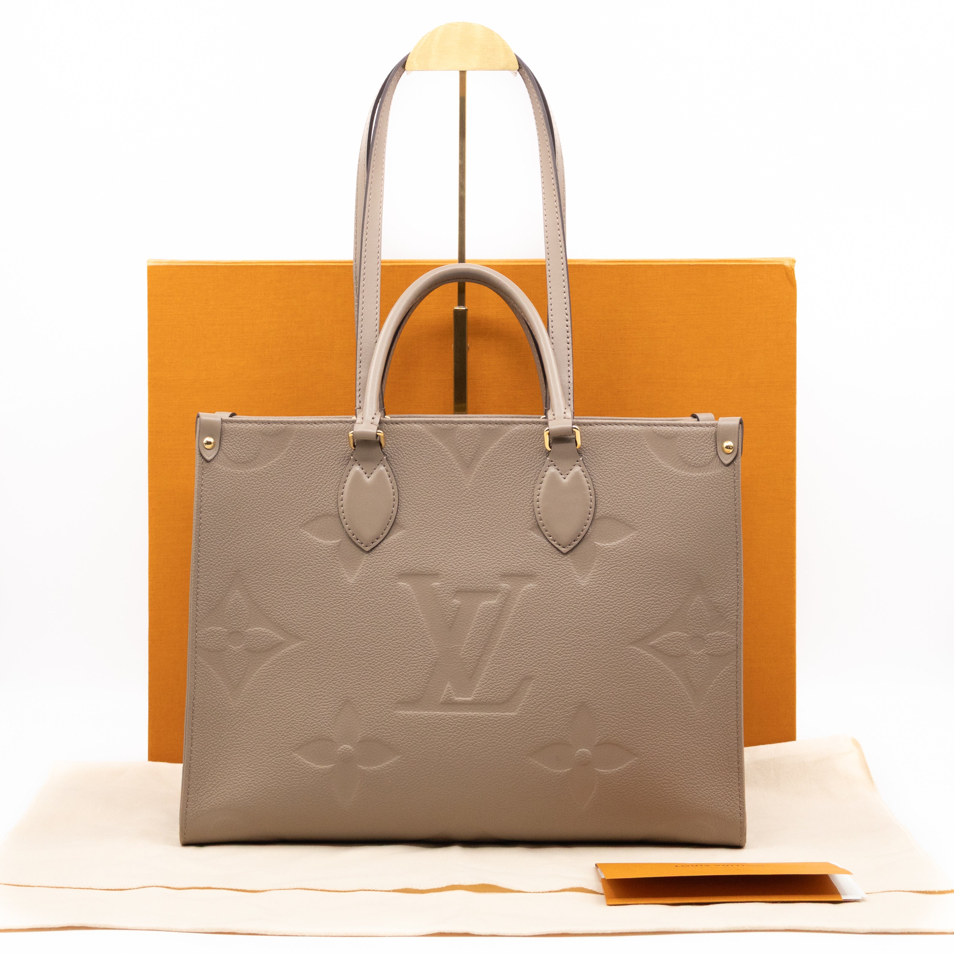 Onthego MM Dune Monogram Empreinte