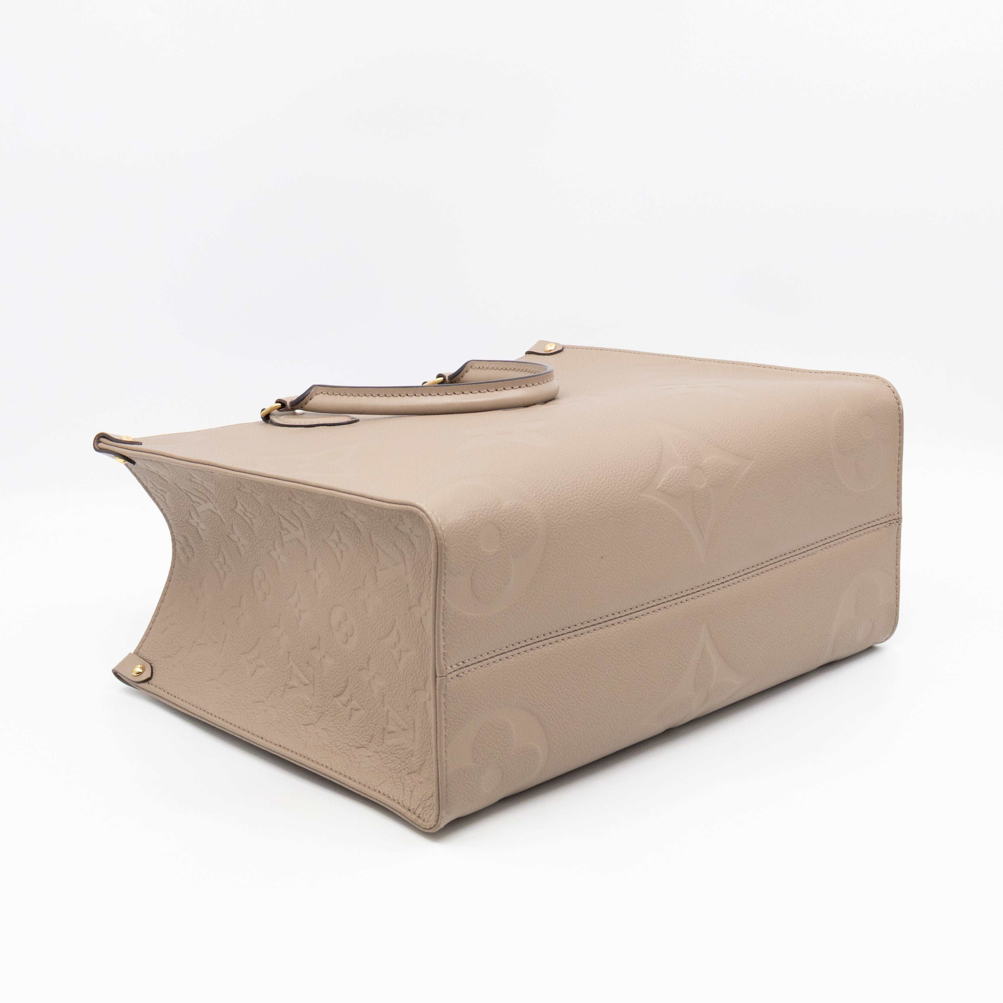 Onthego MM Dune Monogram Empreinte