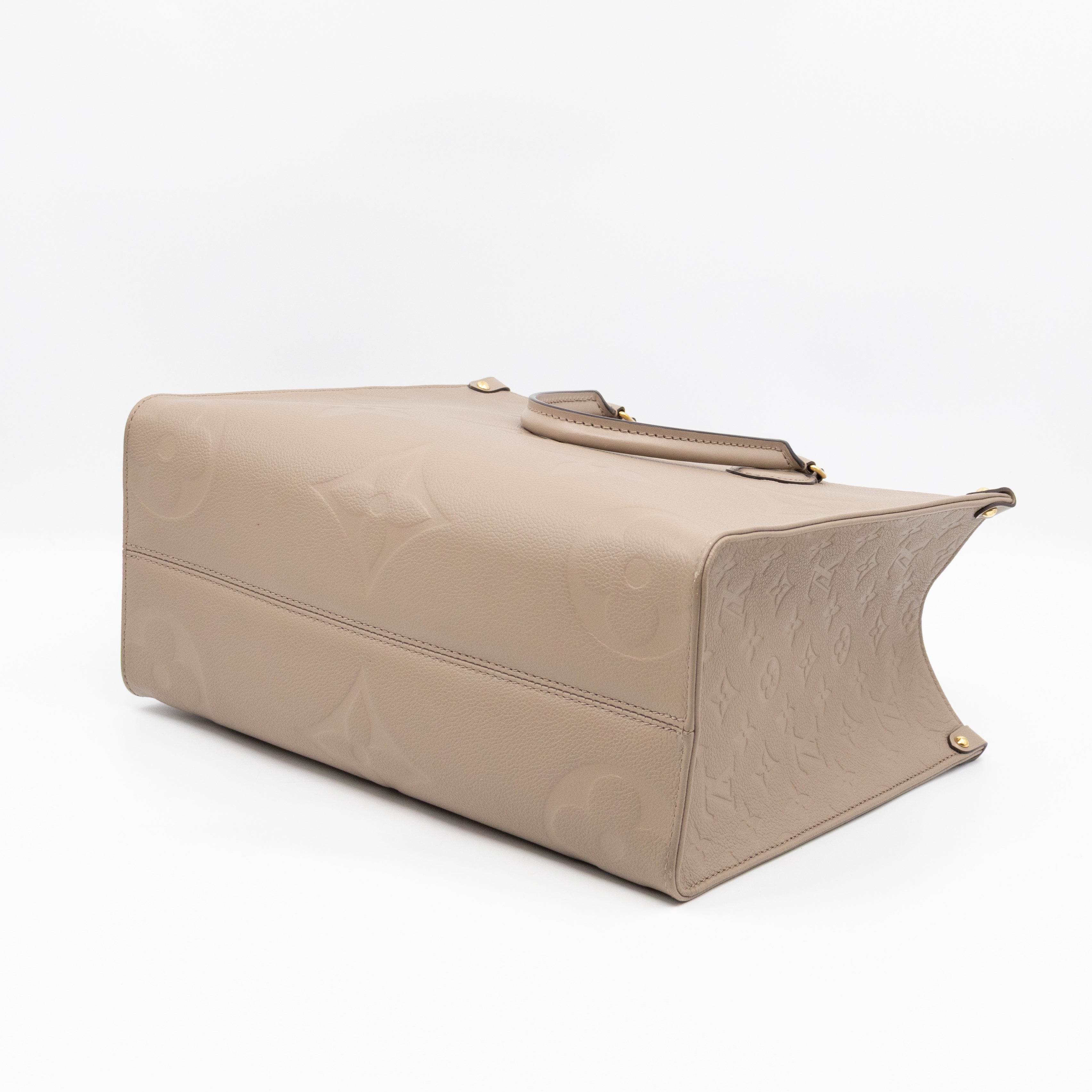 Onthego MM Dune Monogram Empreinte