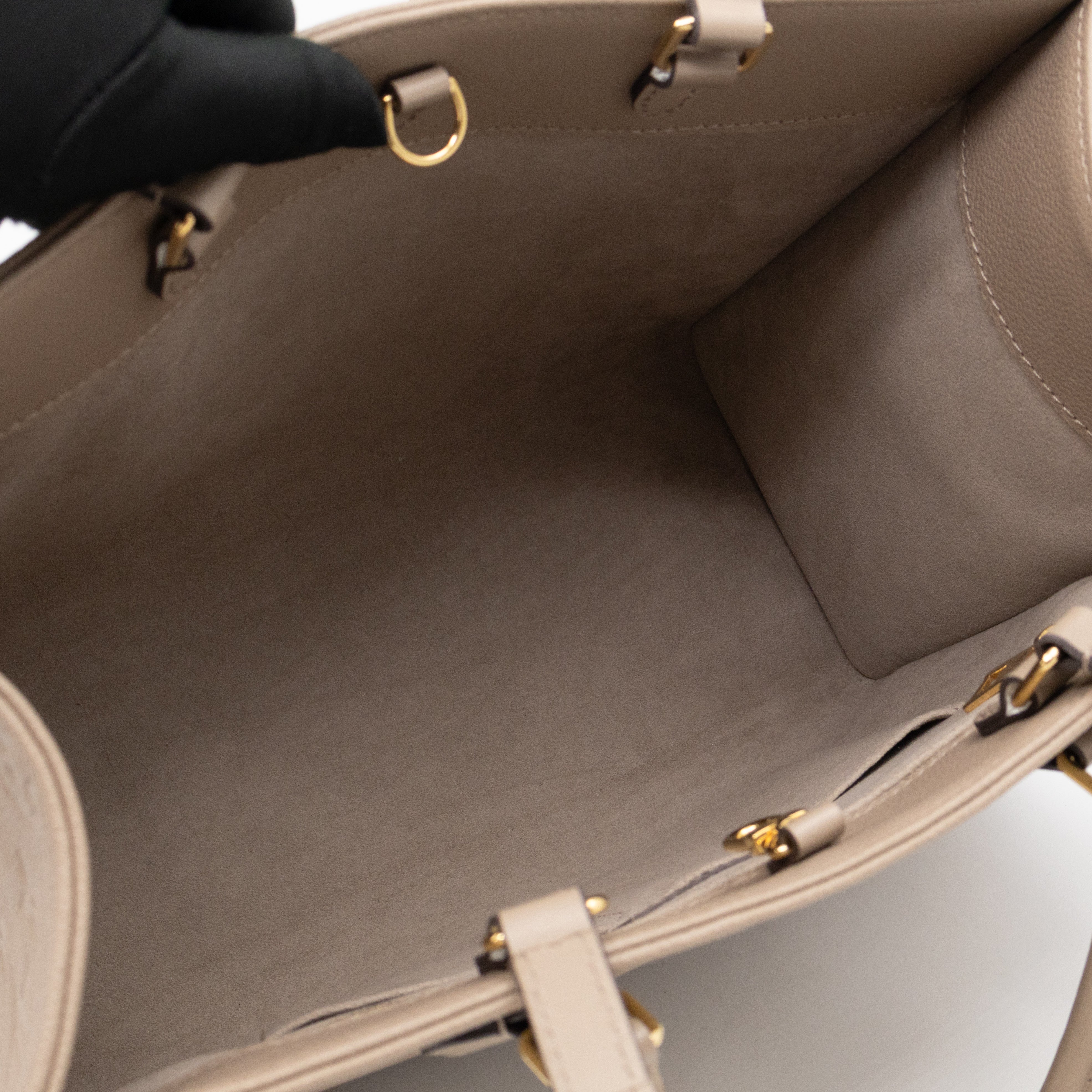 Onthego MM Dune Monogram Empreinte