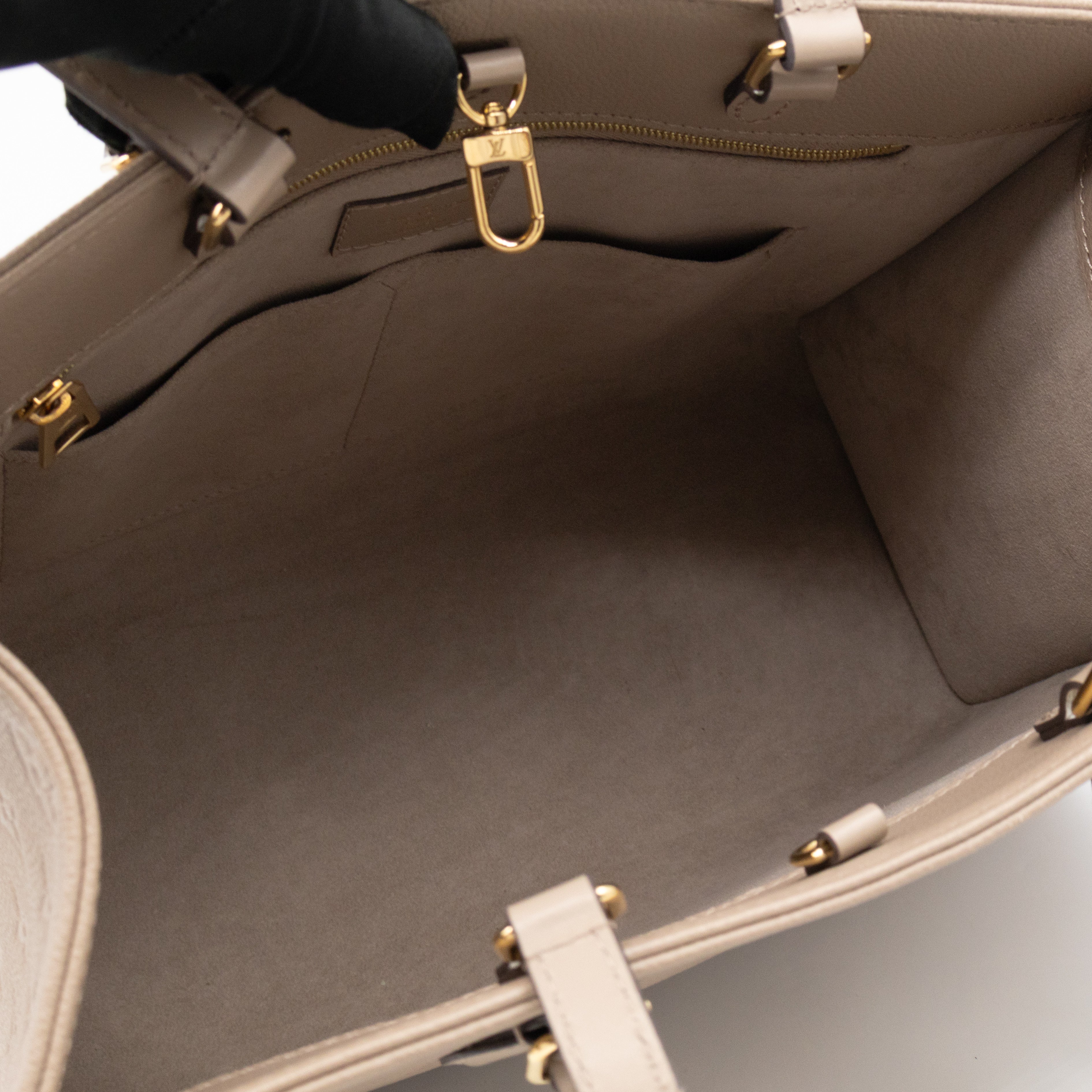 Onthego MM Dune Monogram Empreinte