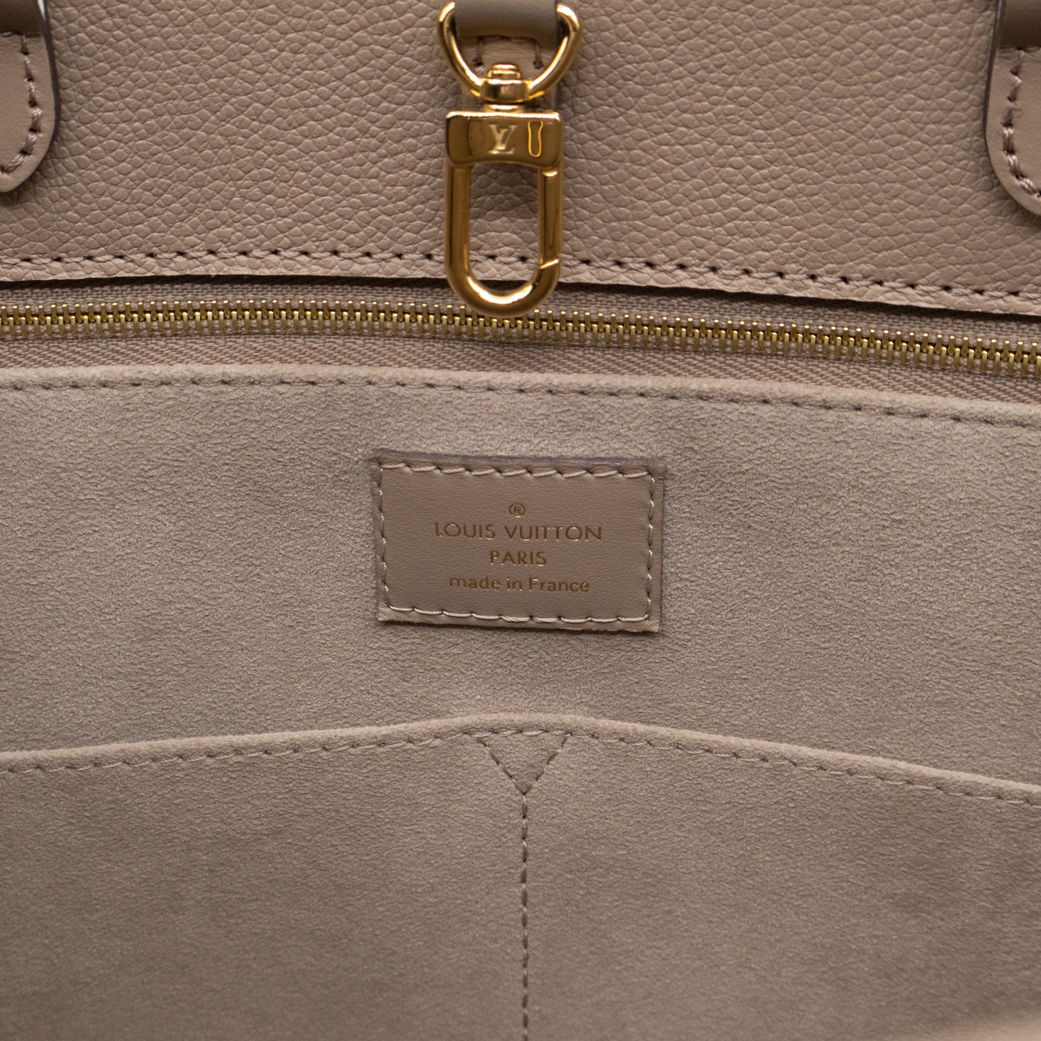 Onthego MM Dune Monogram Empreinte