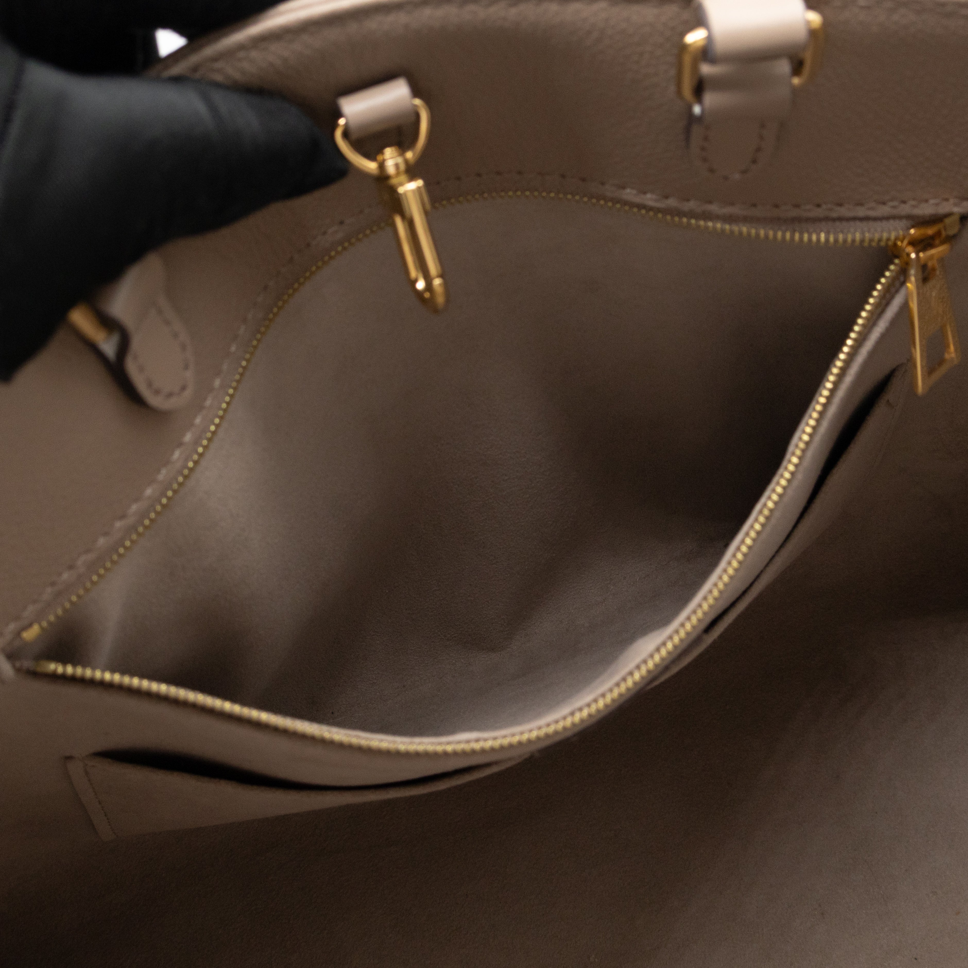 Onthego MM Dune Monogram Empreinte