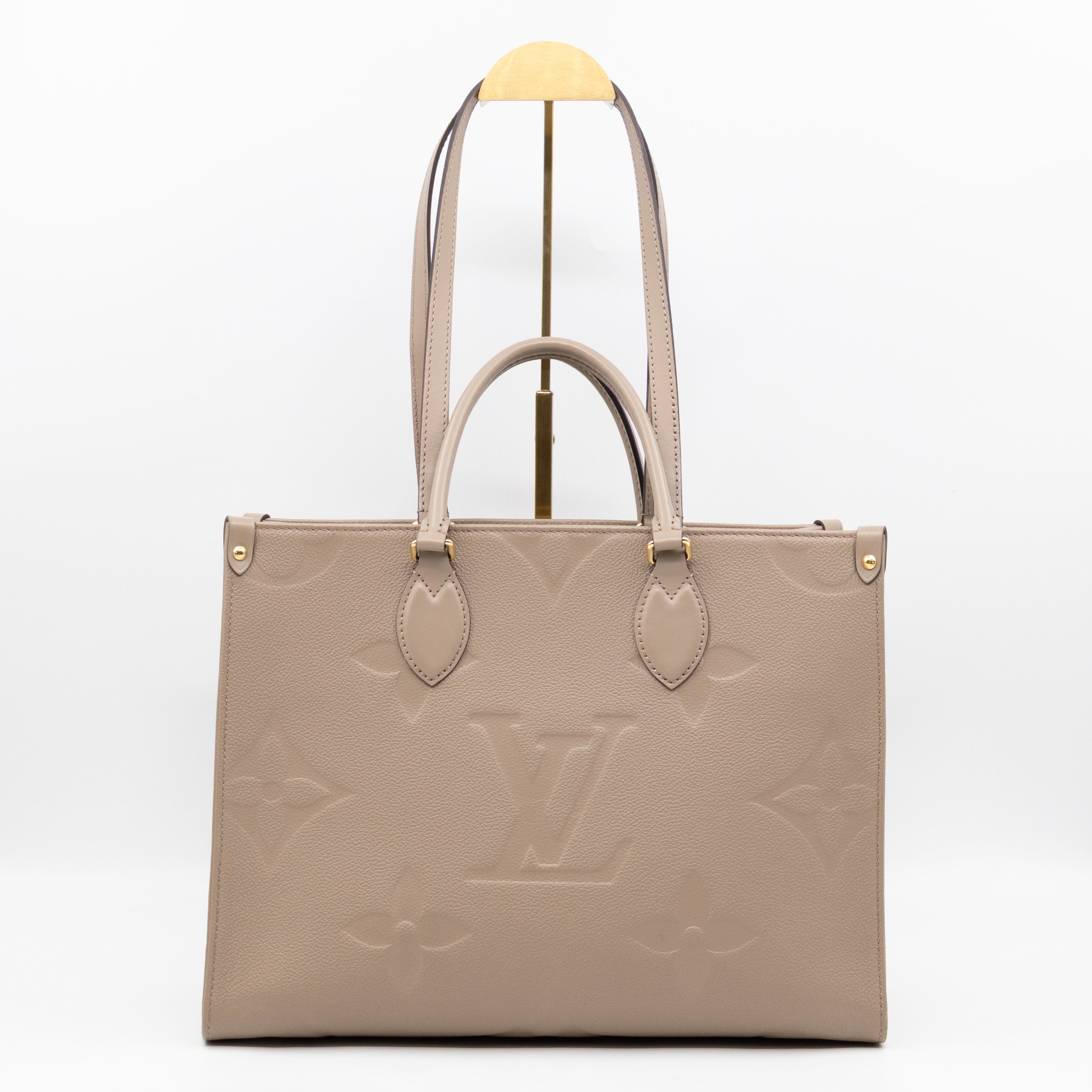 Onthego MM Dune Monogram Empreinte