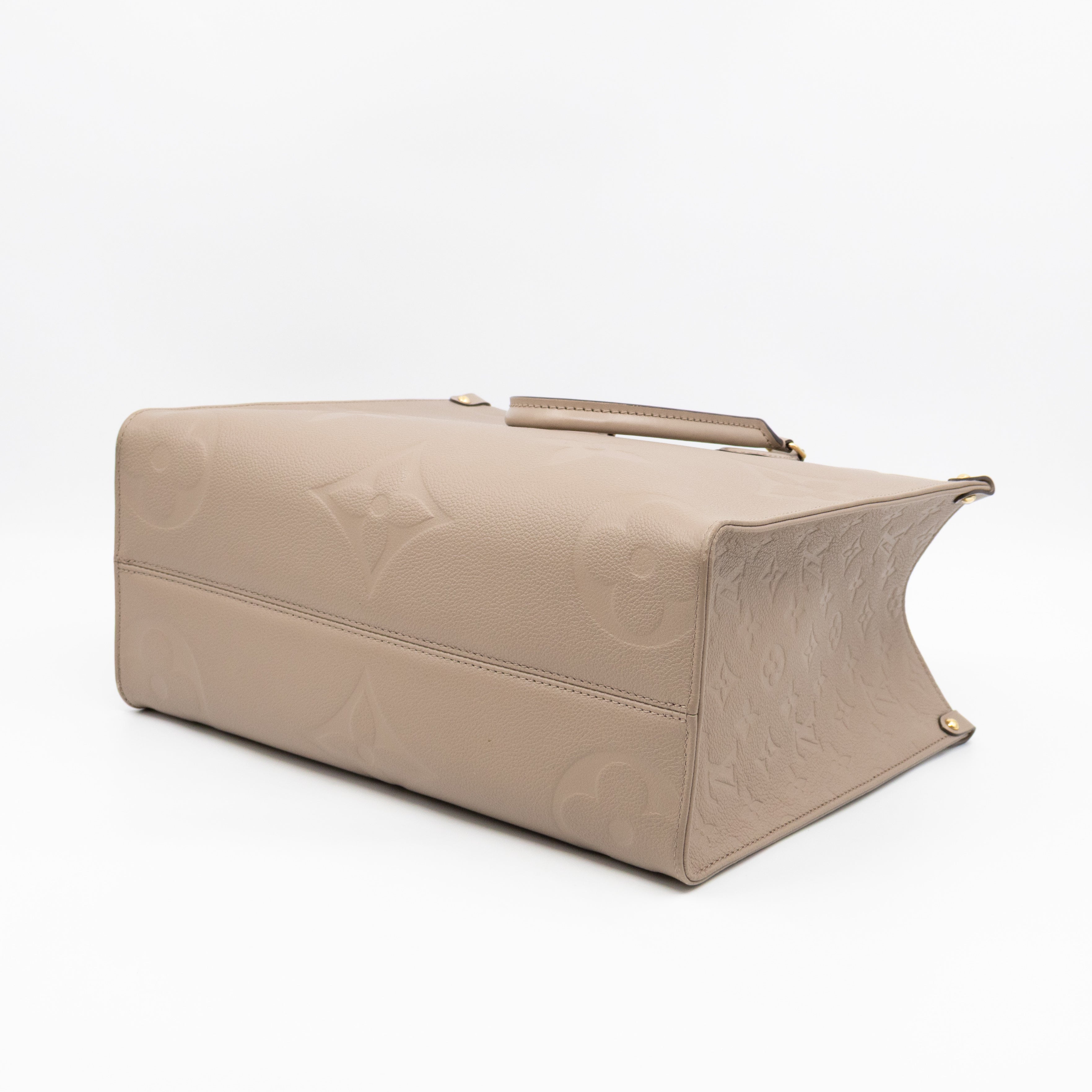 Onthego MM Dune Monogram Empreinte