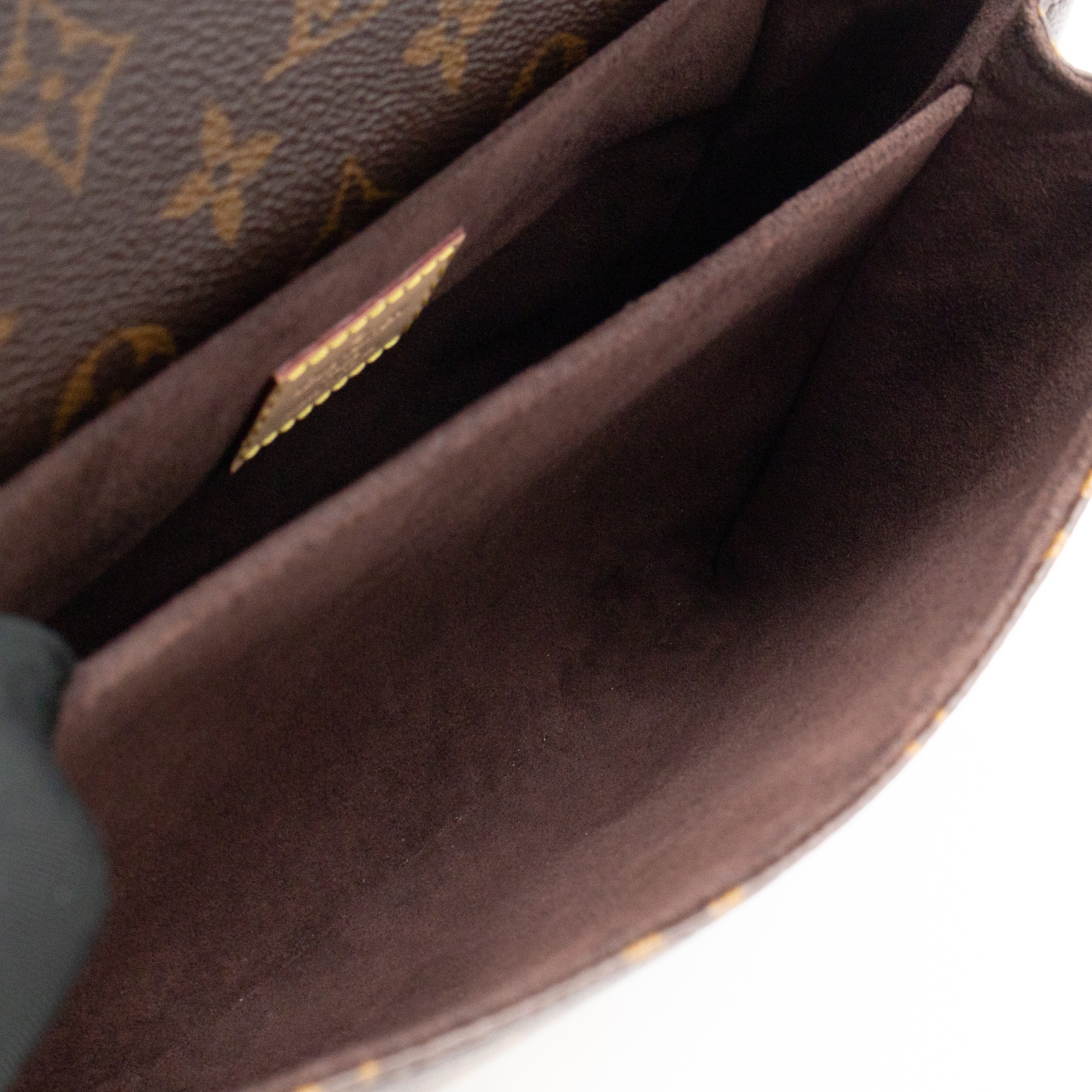 Pochette Metis Monogram