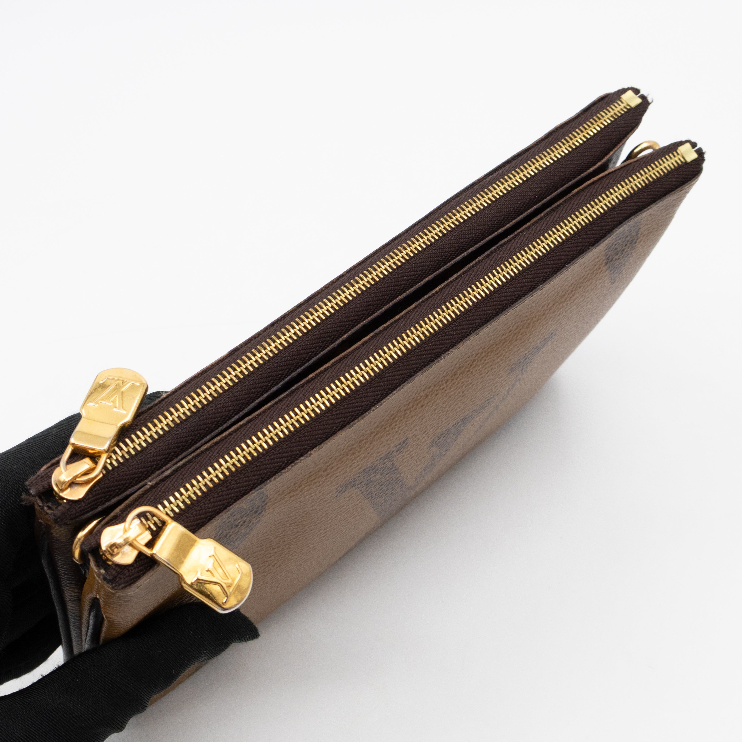 Double Zip Pochette Monogram Giant Reverse