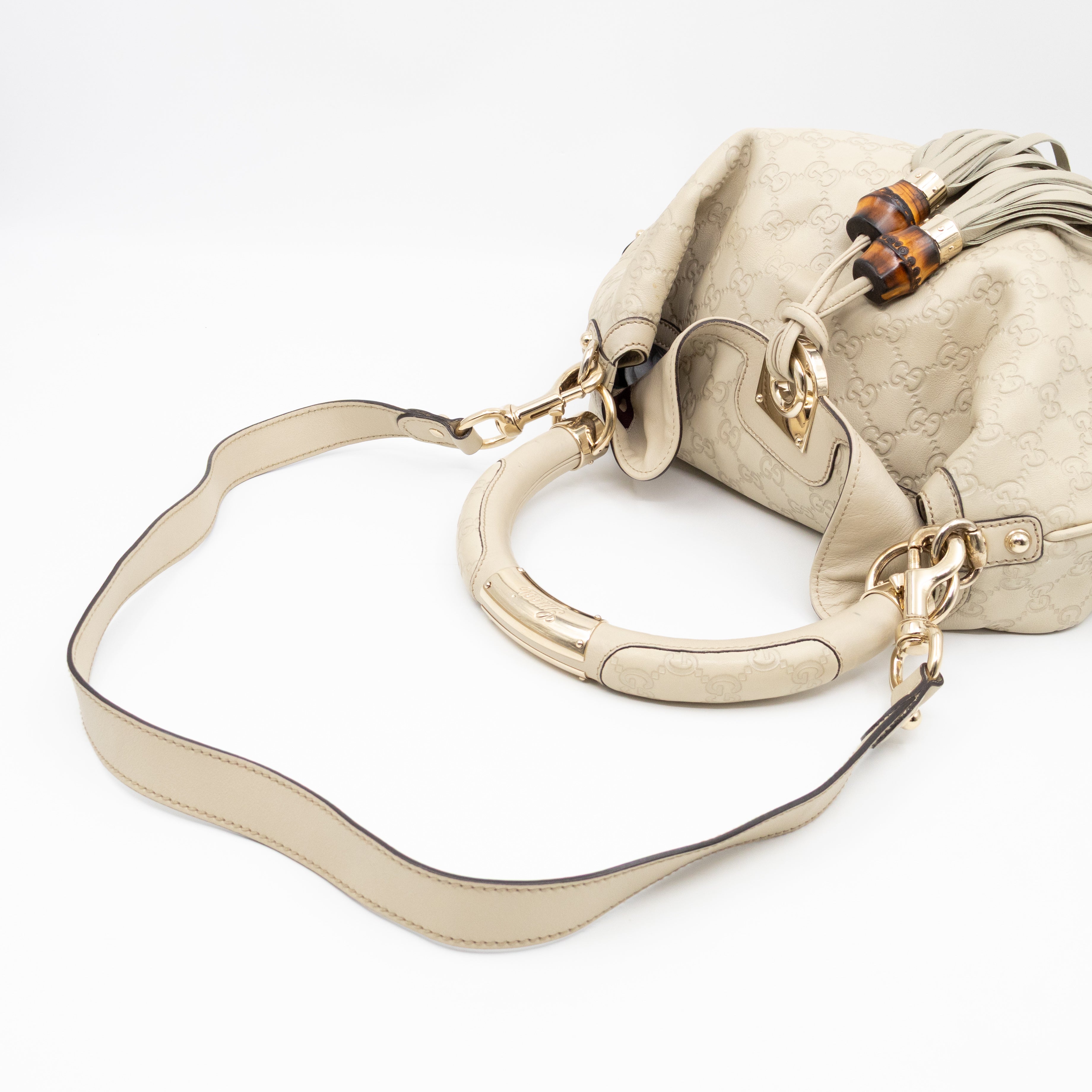 Indy Top Handle Guccissima Ivory Leather