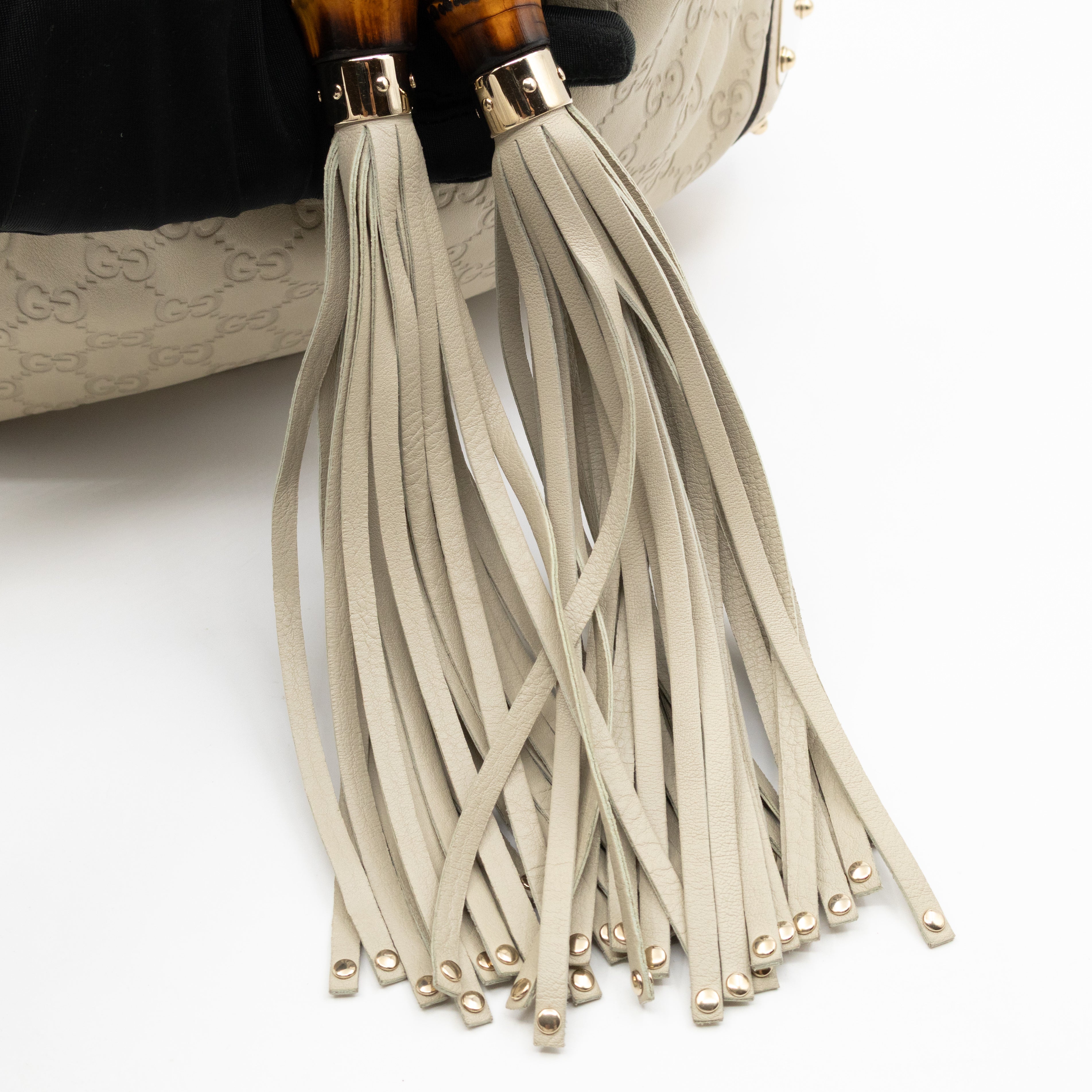 Indy Top Handle Guccissima Ivory Leather