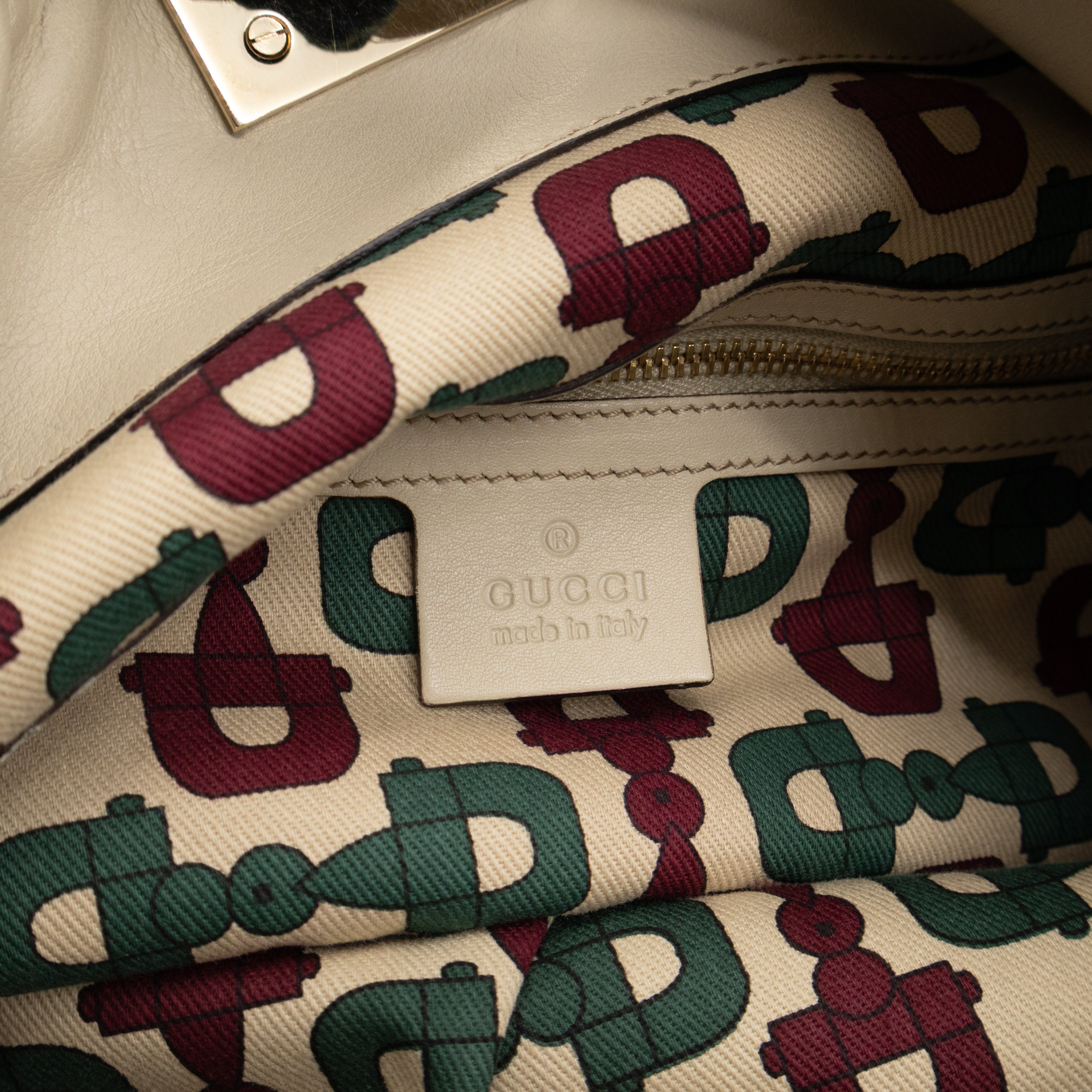 Indy Top Handle Guccissima Ivory Leather