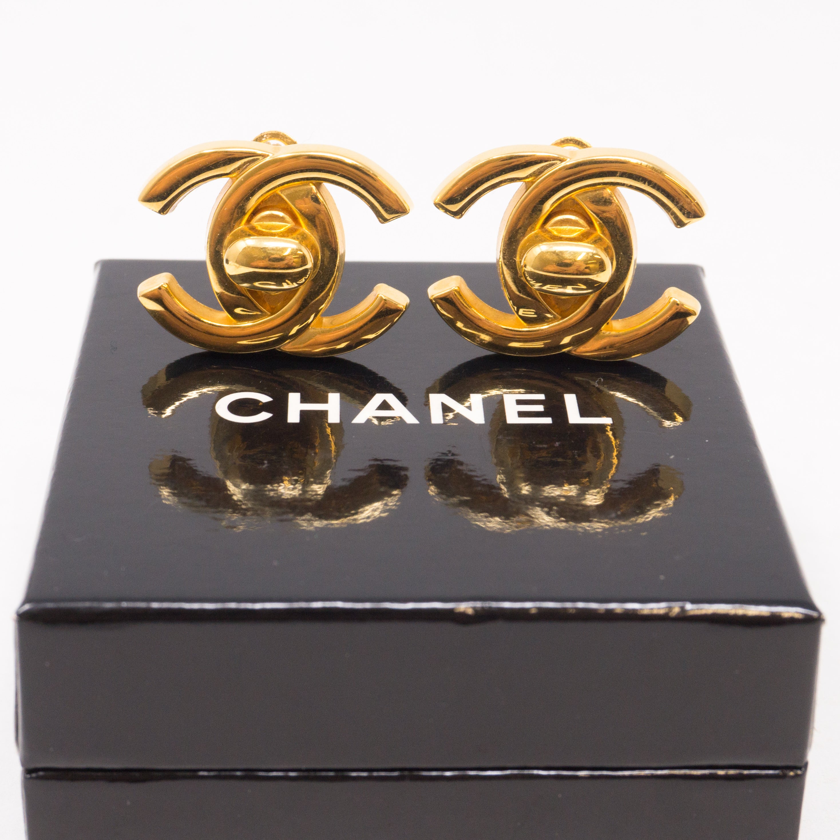 CC Turn Lock Earrings