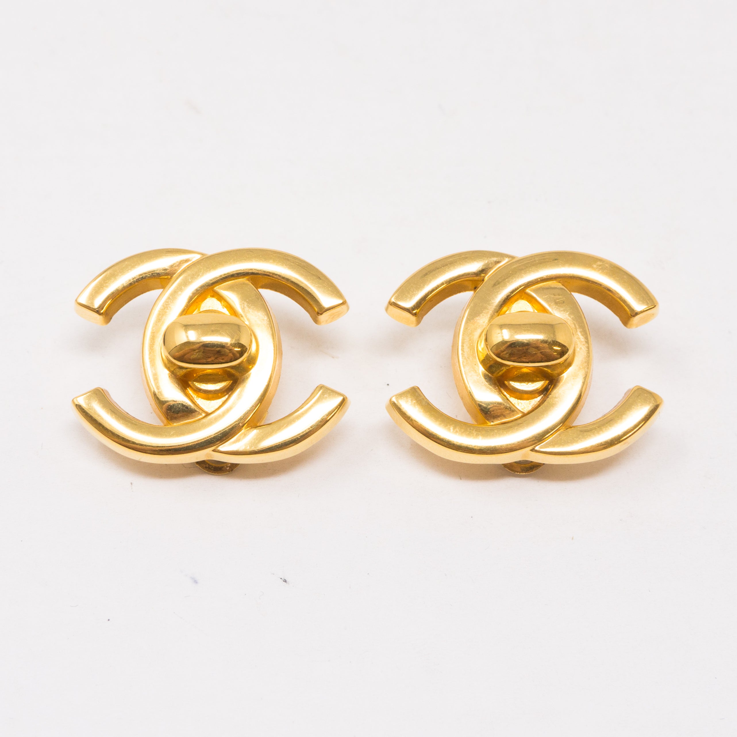 CC Turn Lock Earrings