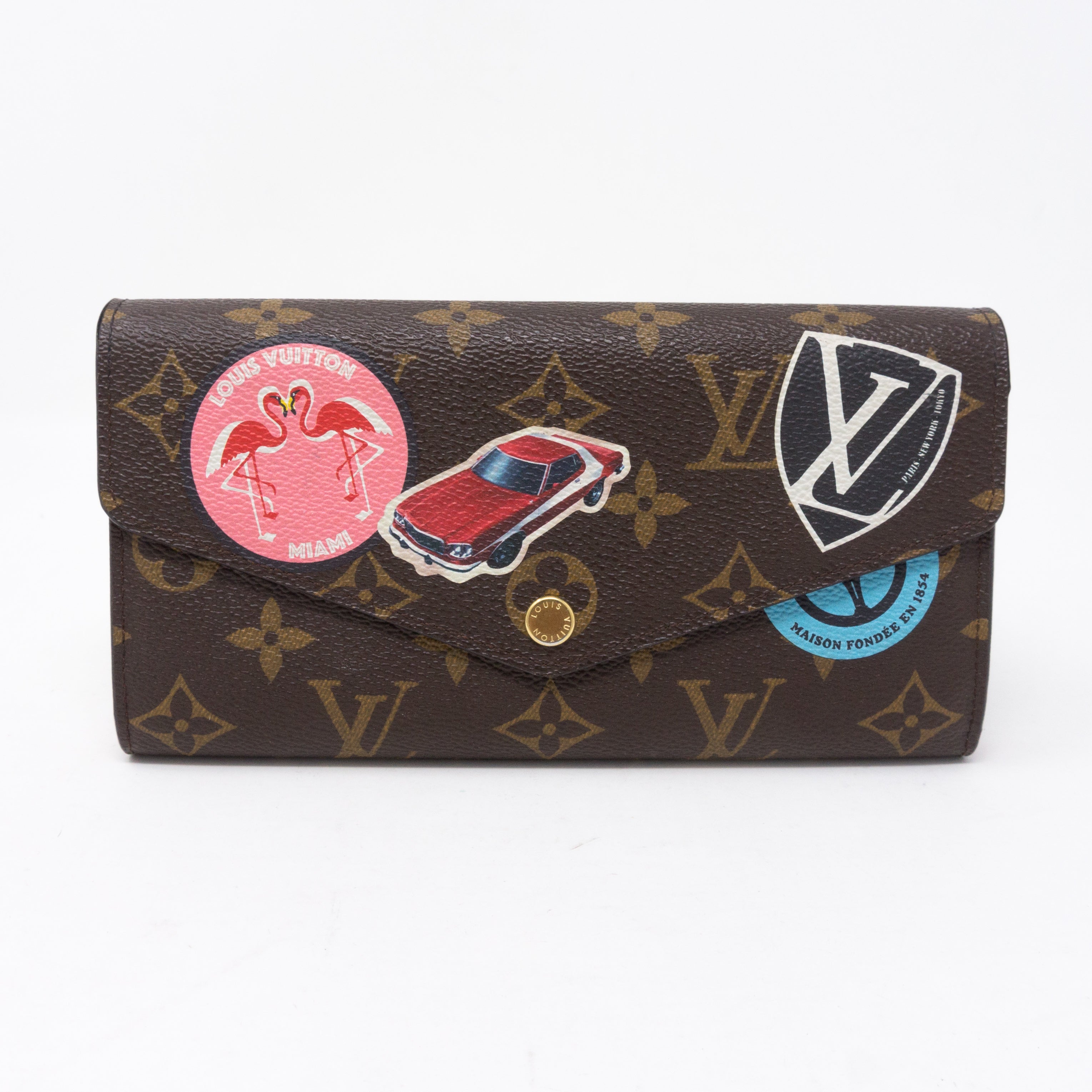 Sarah Wallet Monogram World Tour