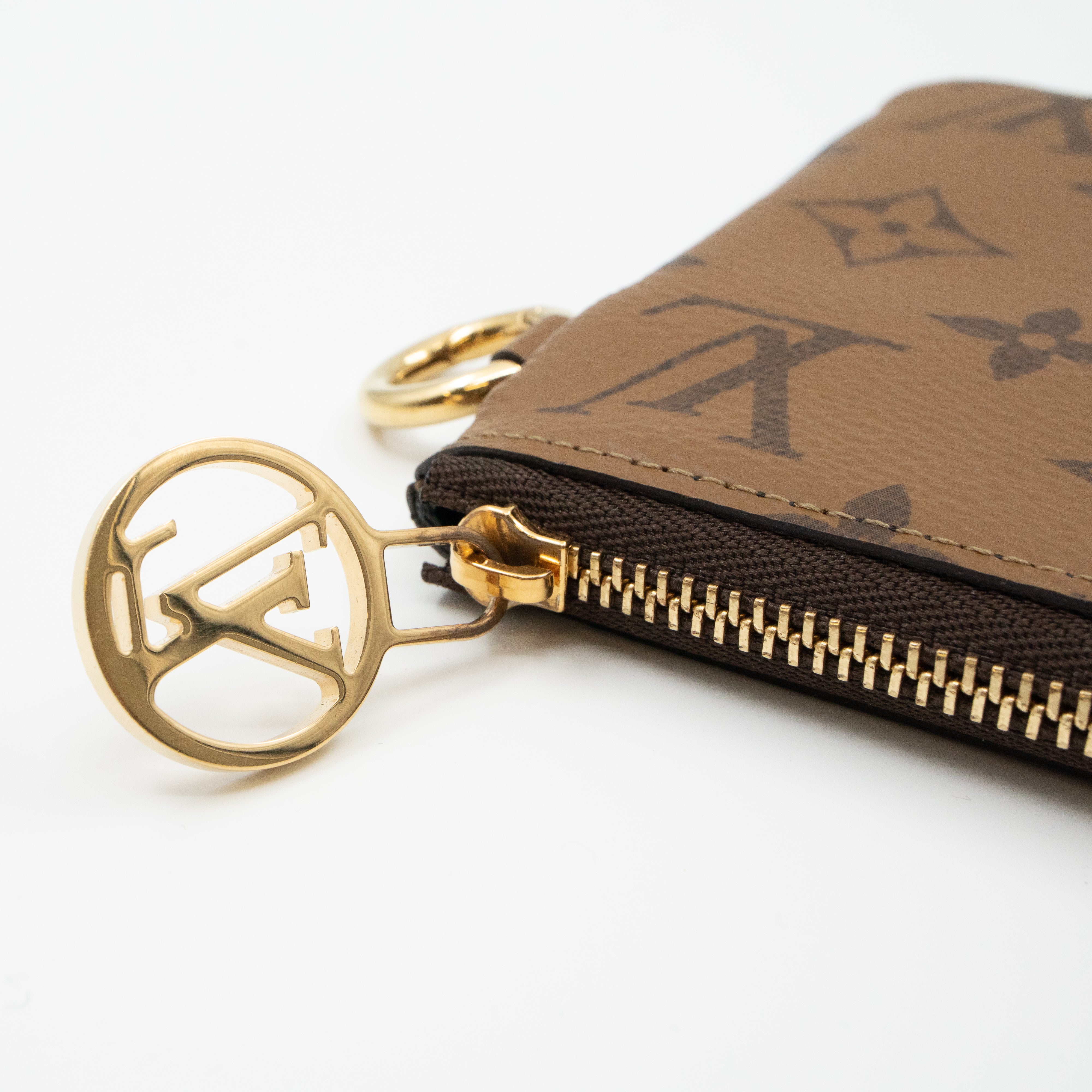 Trio Pouch Medium Monogram Reverse