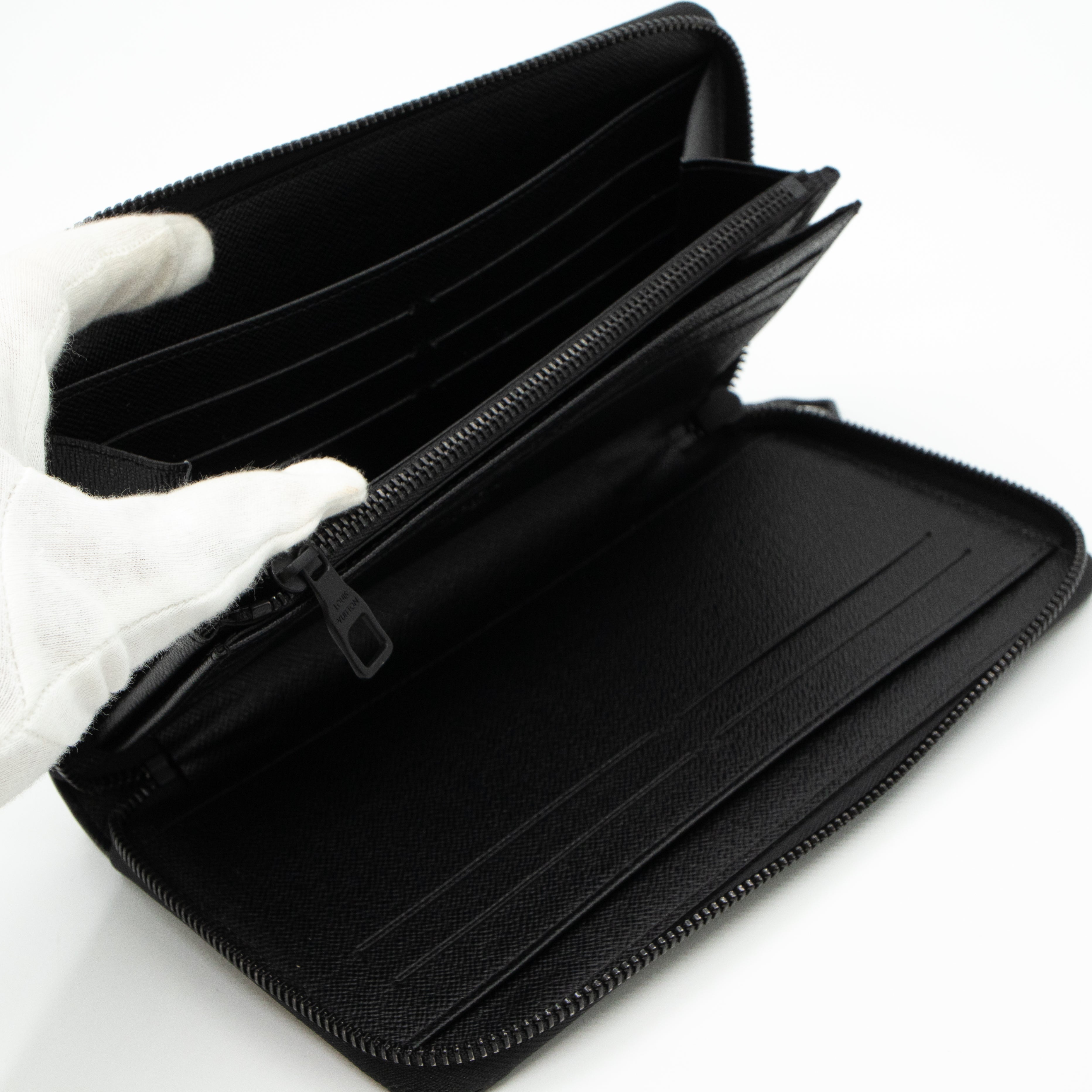 Zippy Organizer Wallet Monogram Logo Story