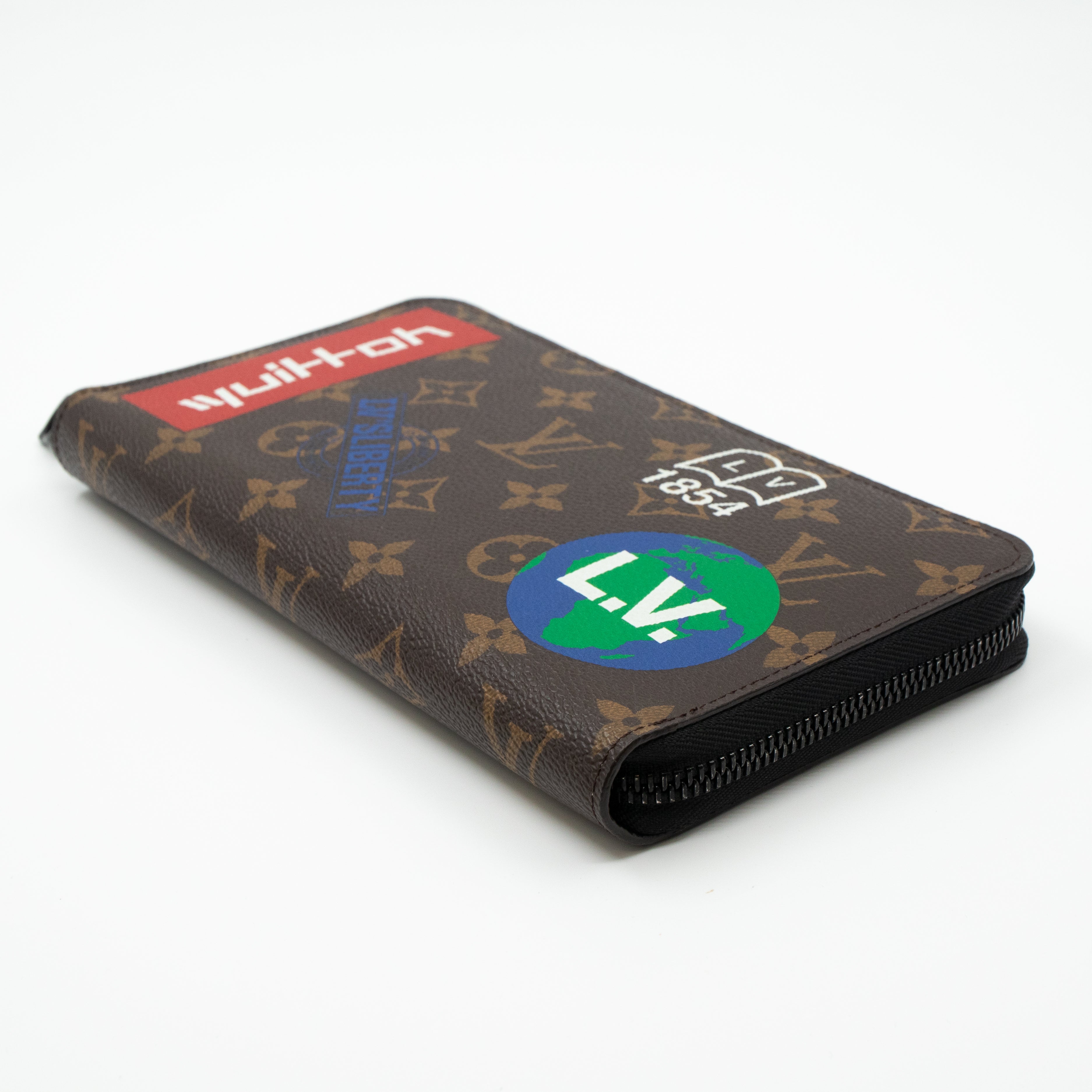Zippy Organizer Wallet Monogram Logo Story