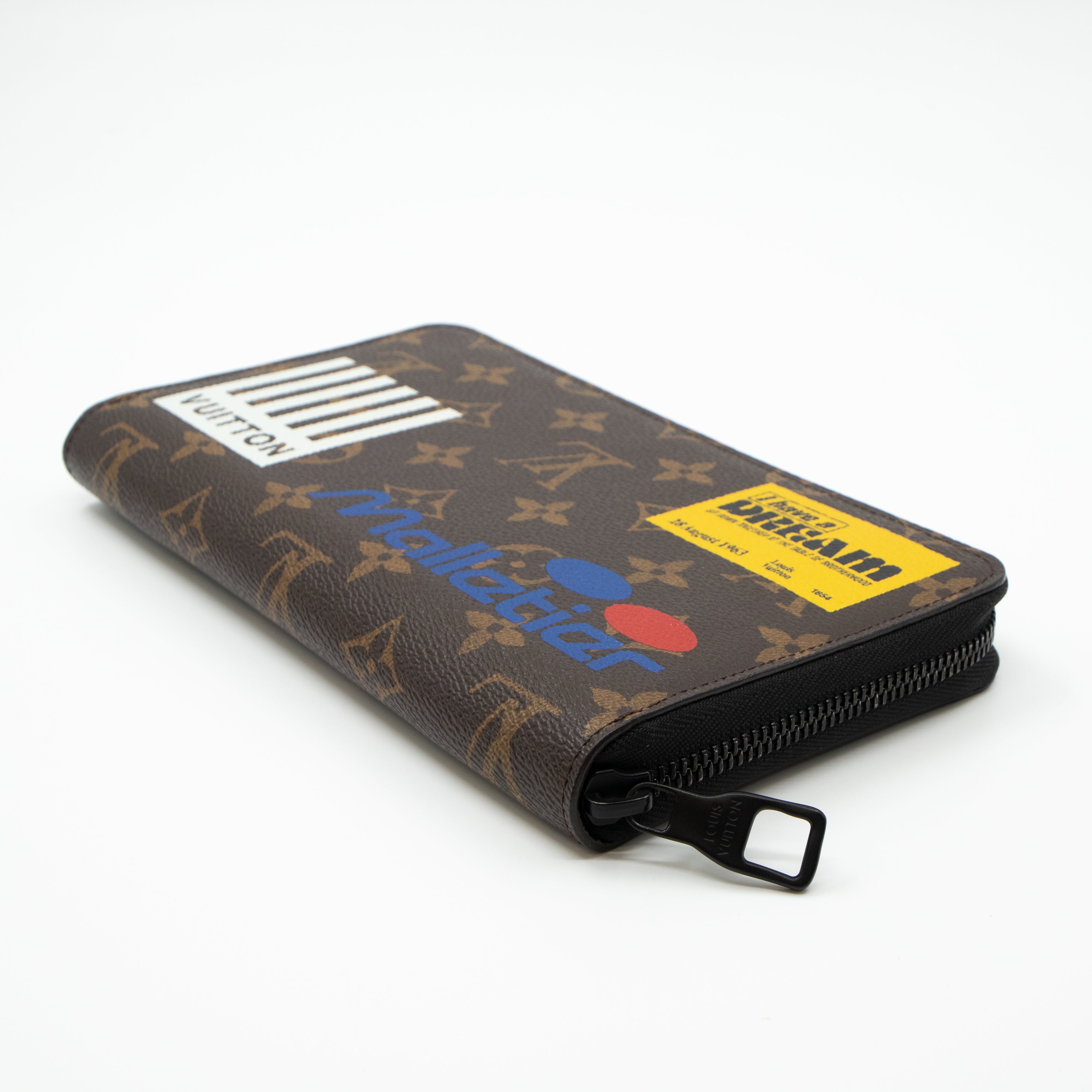 Zippy Organizer Wallet Monogram Logo Story