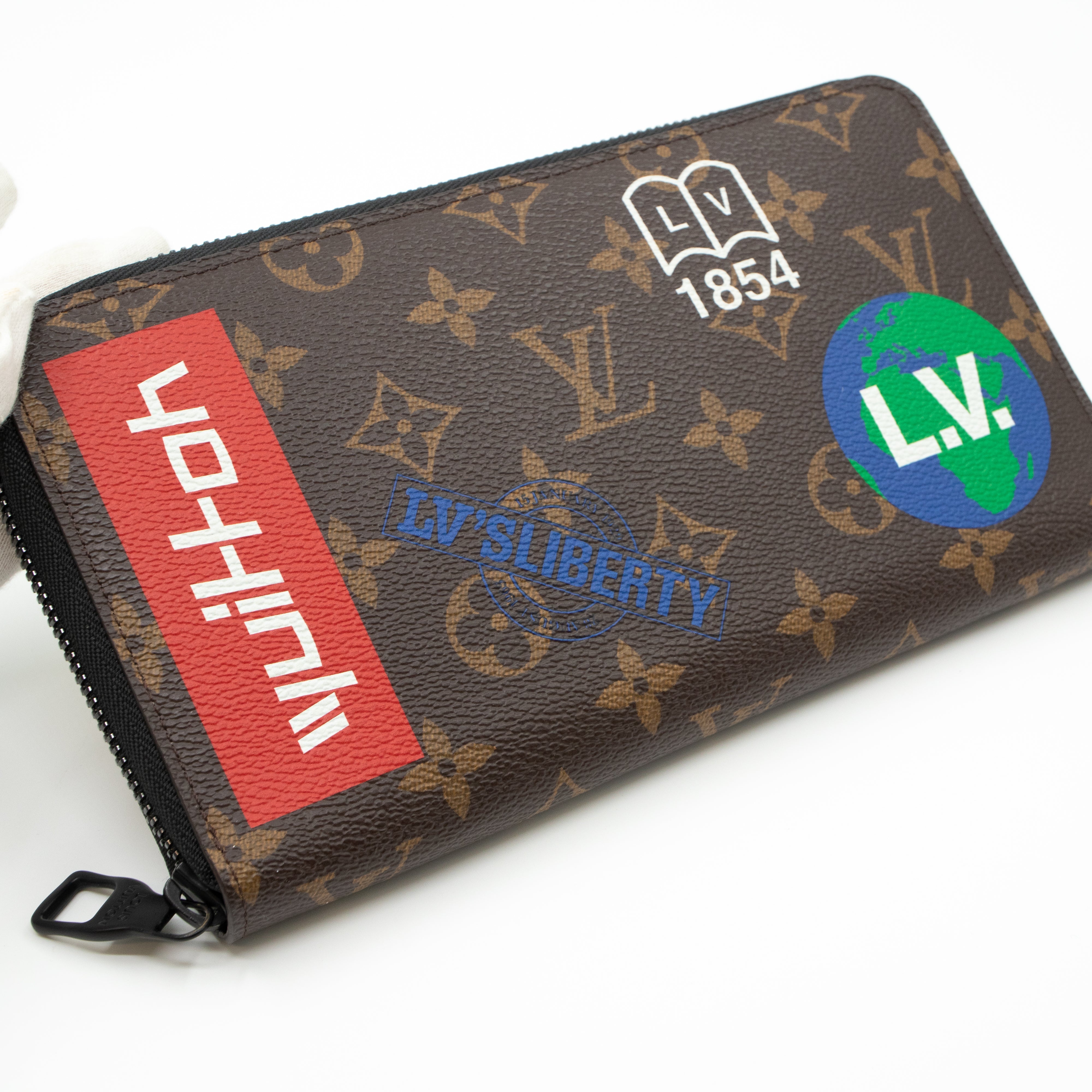 Zippy Organizer Wallet Monogram Logo Story