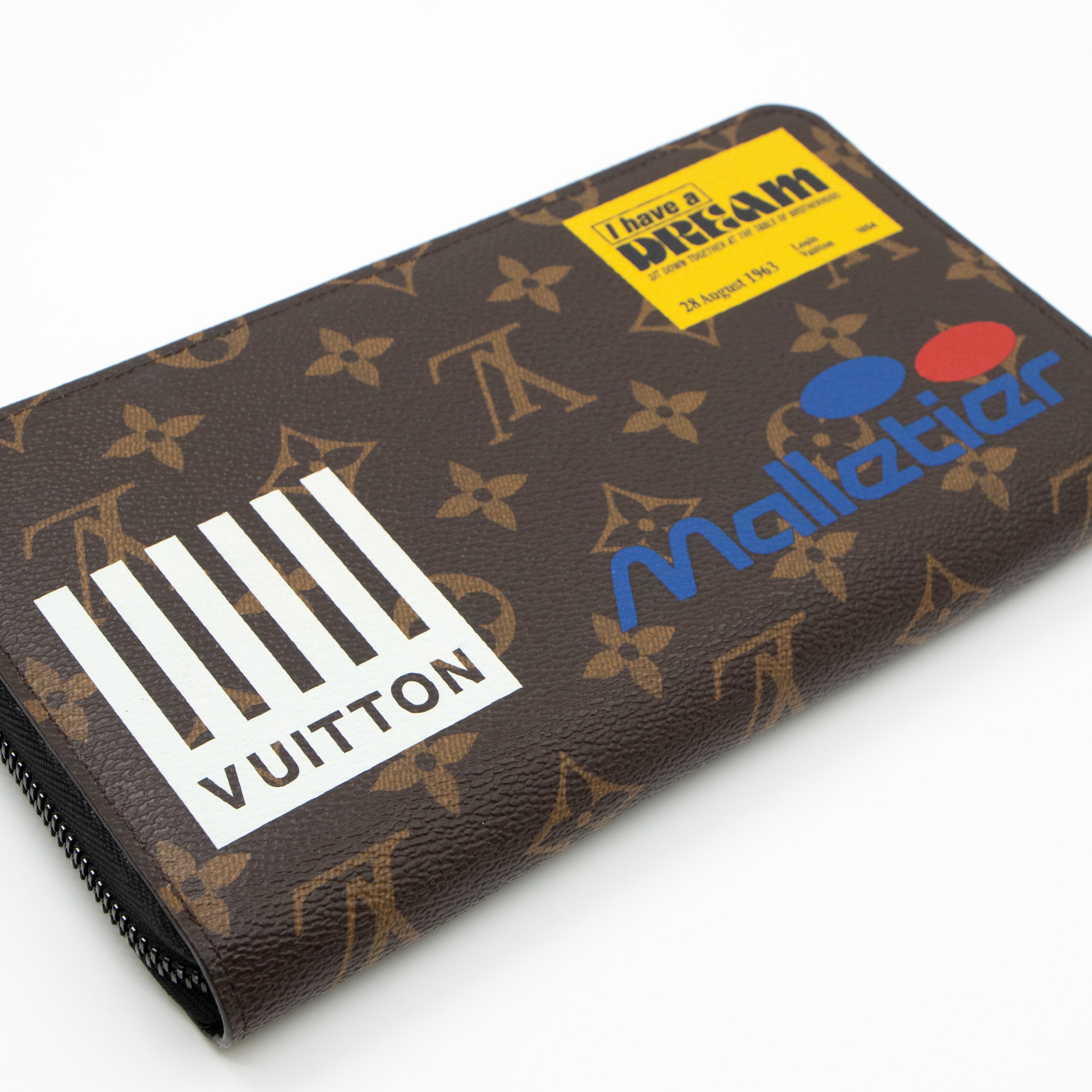Zippy Organizer Wallet Monogram Logo Story