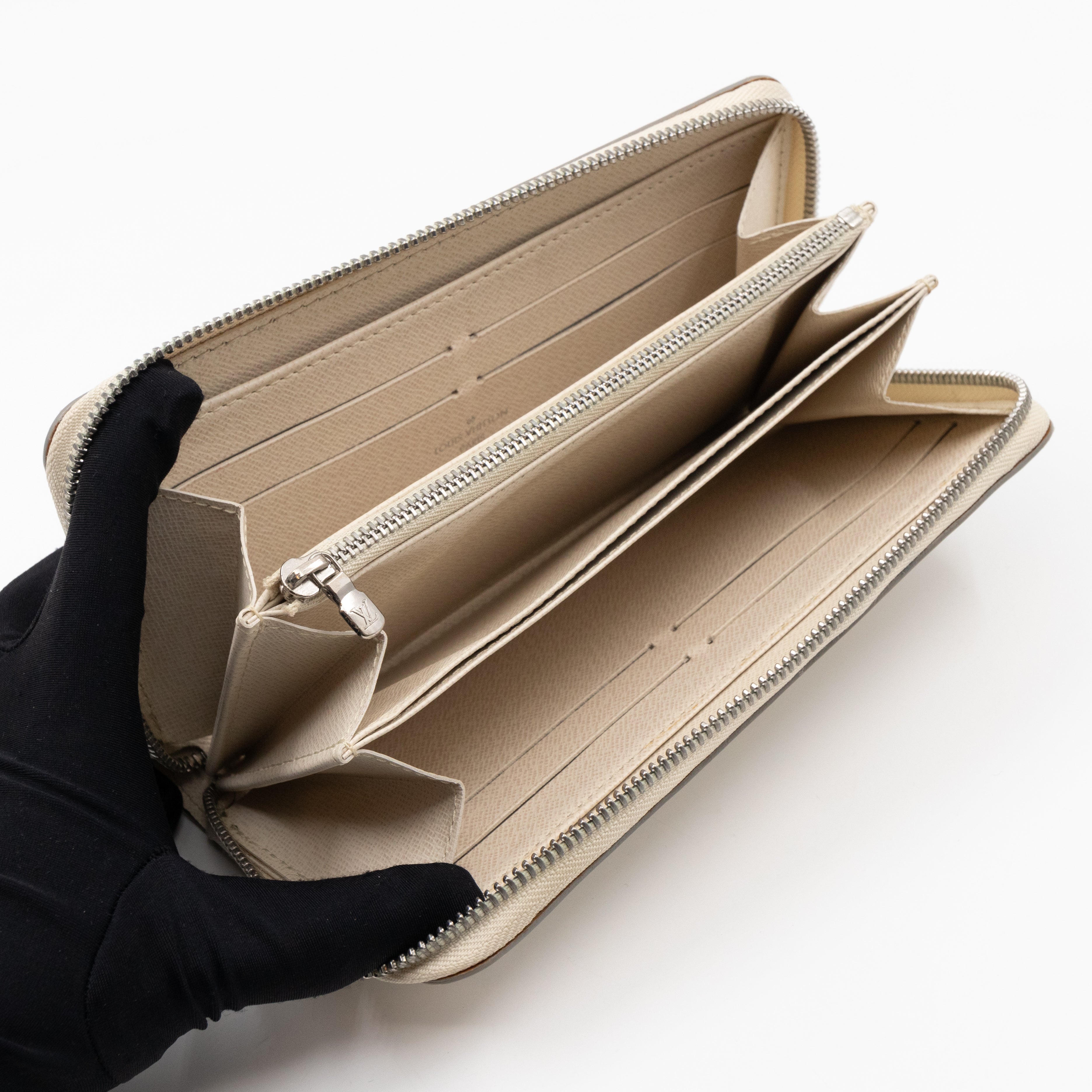Zippy Wallet Ivory Epi Leather
