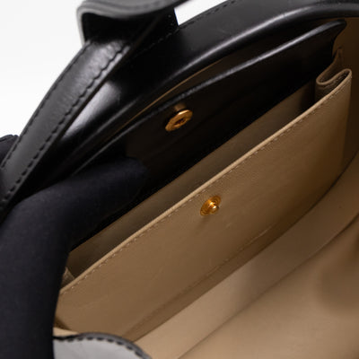Anagram Round Top Handle Bag Black Calfskin