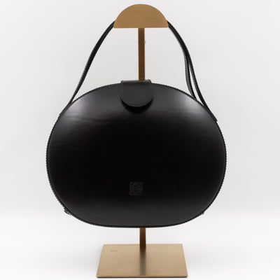 Anagram Round Top Handle Bag Black Calfskin