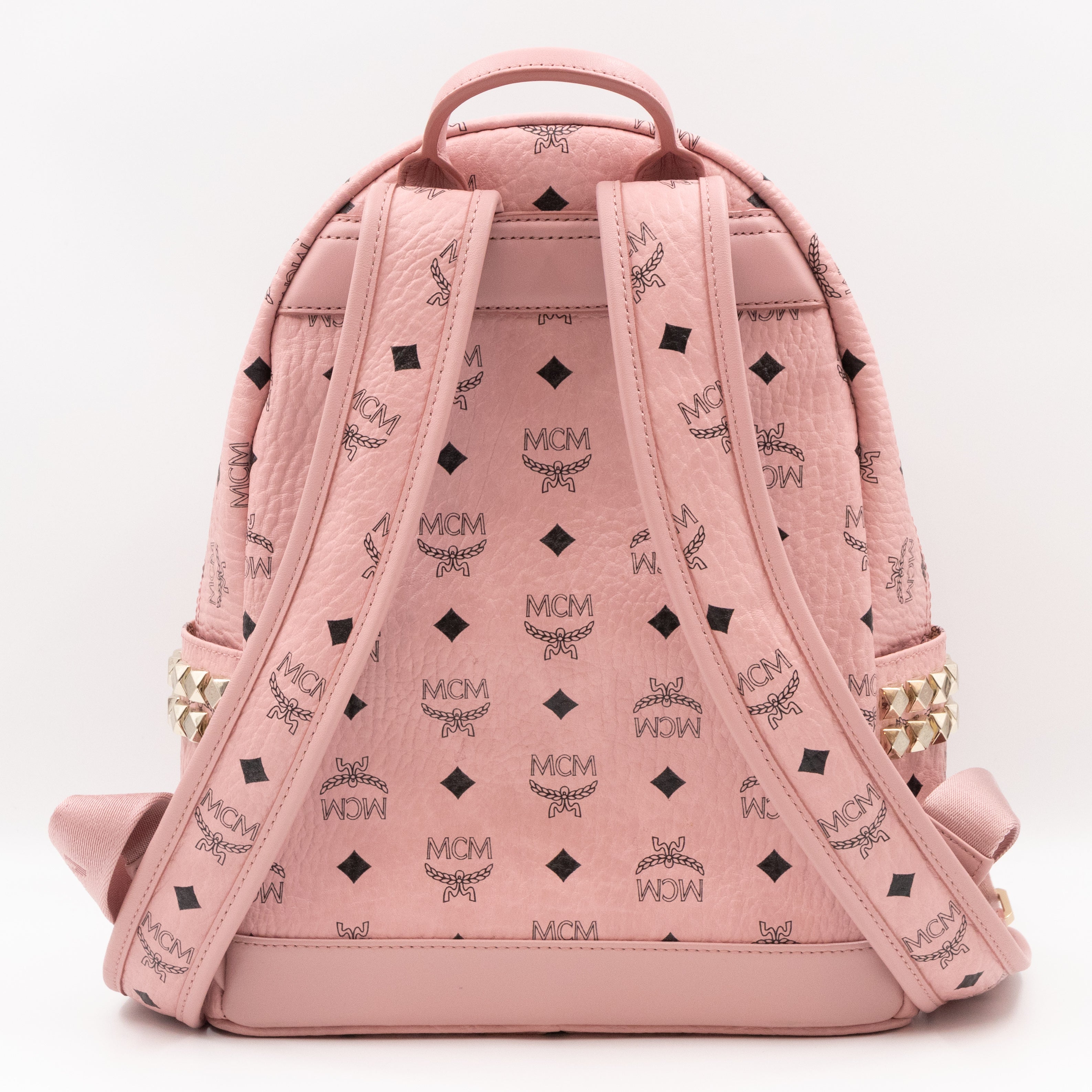 Pink mcm backpack with clearance studs