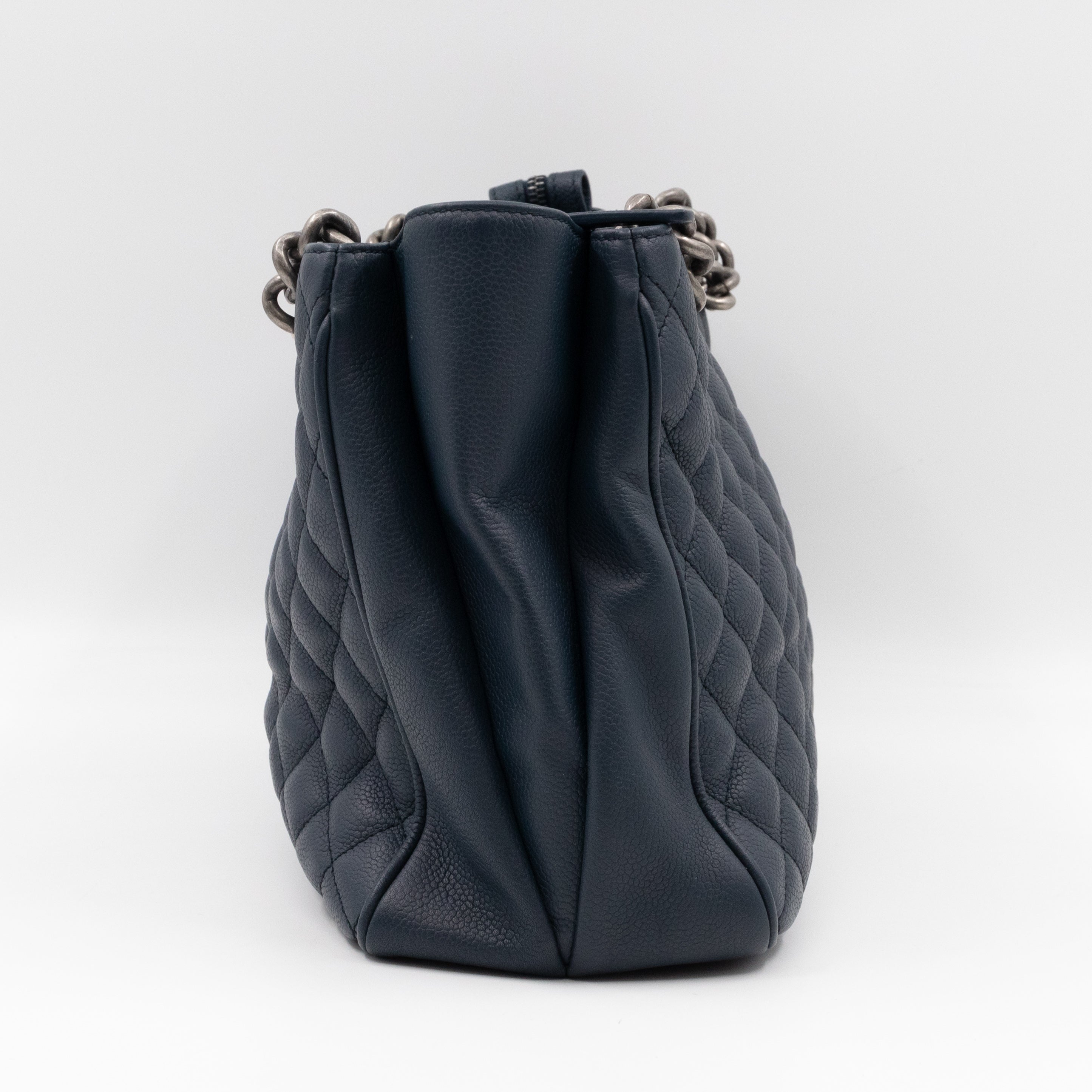 Chanel zipped shopping online bag