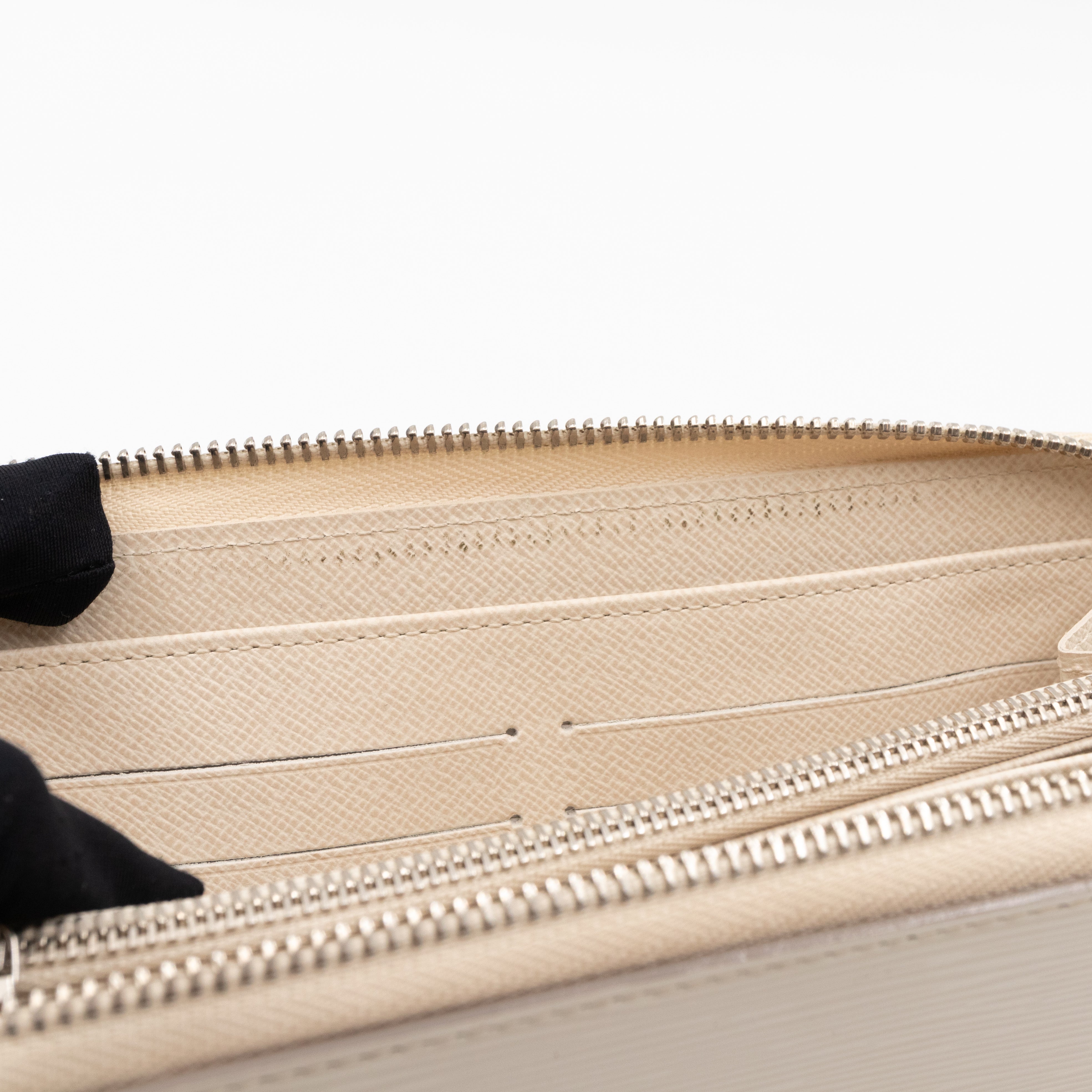 Zippy Wallet Ivory Epi Leather