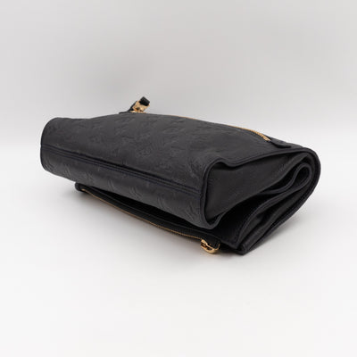 Petillante Clutch Bleu Infini Monogram Empreinte