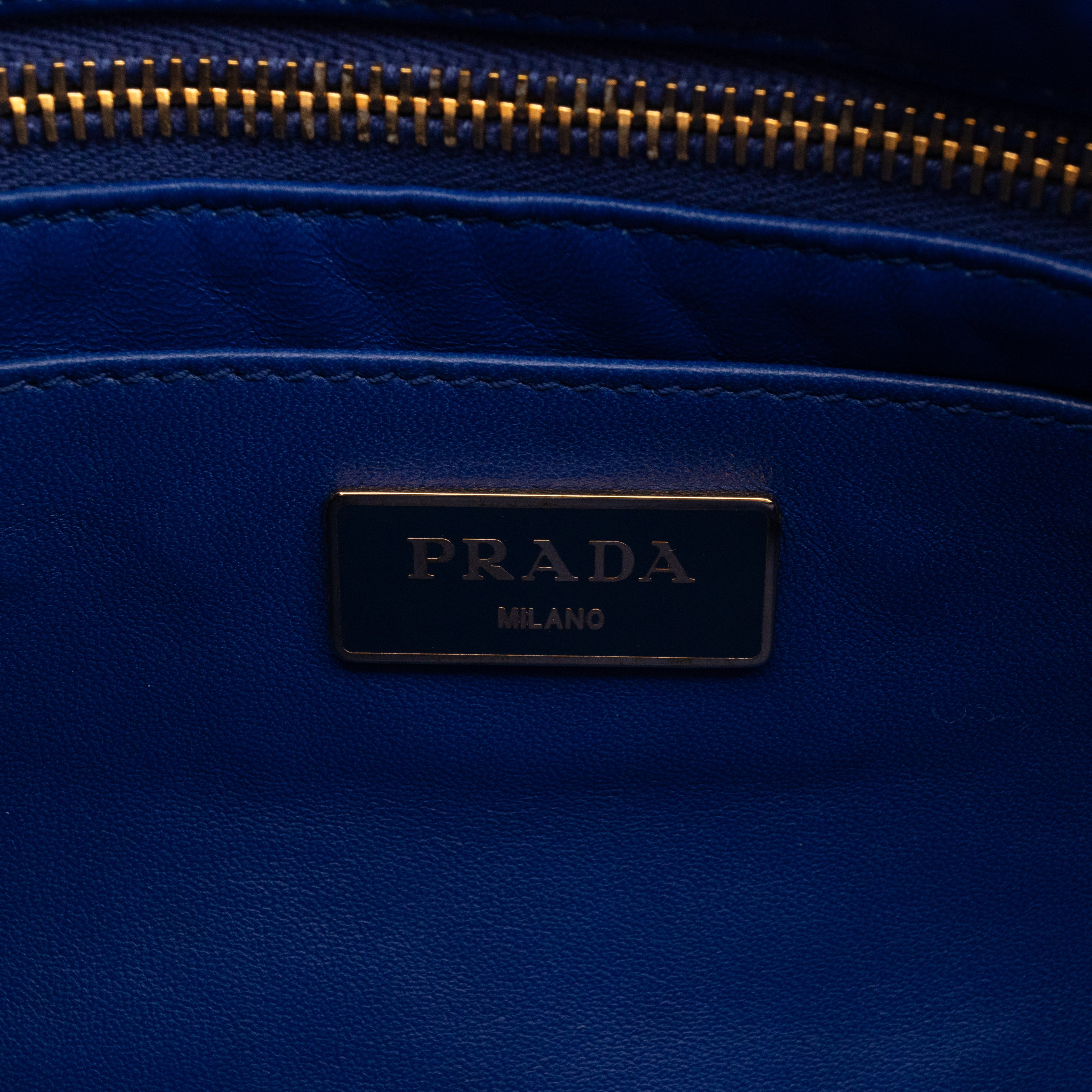 Ribbon Clutch Blue Leather